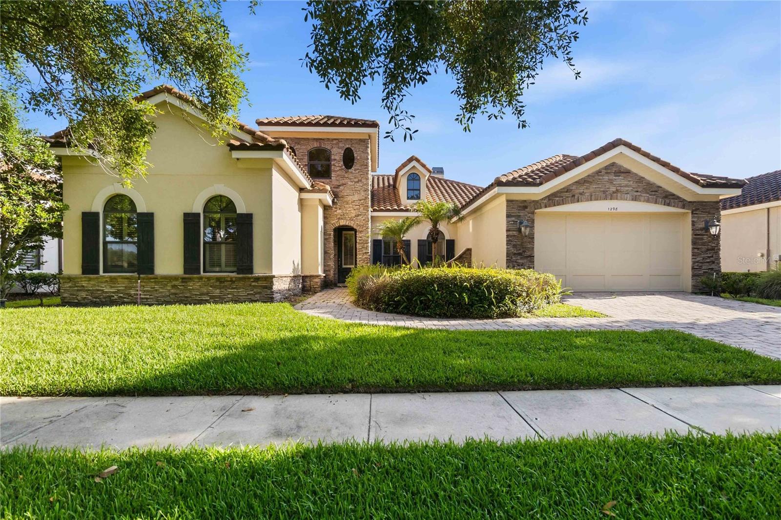 Welcome to this beautifully maintained Mediterranean-style home in the sought-after gated community
of Bella Vista in Longwood. Built in 2008, new AC in 2025,,this spacious 3-bedroom, one office ,2 full and 1 half-bath
residence offers approximately 2,587 square feet of thoughtfully designed living space with elegant
finishes throughout. Featuring soaring ceilings, crown molding, wood and tile flooring, a dedicated
office, formal dining room, and an open-concept kitchen overlooking the family room, this home is
perfect for both everyday living and entertaining. The private first-floor owner's suite offers a
spacious walk-in closet and a luxurious bath, while the screened lanai opens to your own
resort-style backyard complete with a sparkling pool and fully equipped outdoor kitchen. A tile
roof, paver patio, and 2-car garage add to the home's curb appeal. Conveniently located near
top-rated Seminole County schools, golf courses, shopping, dining, and major roadways, this