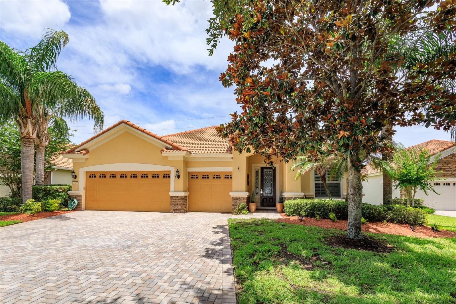 Exceptional opportunity for a gorgeous home set behind the private gates of Meadow Ridge.  Enjoy the peace, privacy and spectacular evening sunsets beside the pool oasis in this highly sought after area of Ocoee/Windermere. This stunning home features 3 bedrooms all en suite (3 baths) and all on one floor as well as a split floor plan.  The double door entry to the dedicated office is perfect for the home worker or home office with quiet privacy.  The expansive family room opens up to indoor/outdoor entertaining from the lanai and can't miss views of the pool and color evening sunsets.  The kitchen is every chef's dream with plenty of space for more than one cook in the kitchen, stainless appliances, eat-in space in the kitchen, coffee bar area and views of the pool and lanai. Separate formal dining space, separate laundry room under air, over sized 3 car garage with ceiling rack storage, paver driveway, tile roof round out this amazing home you won't want to miss.  Pool rescreened 2026, pool pump and pool heater 2025. Excellent location to major thoroughfares, 30 minutes to international airport, 20 min to Disney and all theme parks, minutes to restaurant row and downtown Winter Garden for dining and shopping.