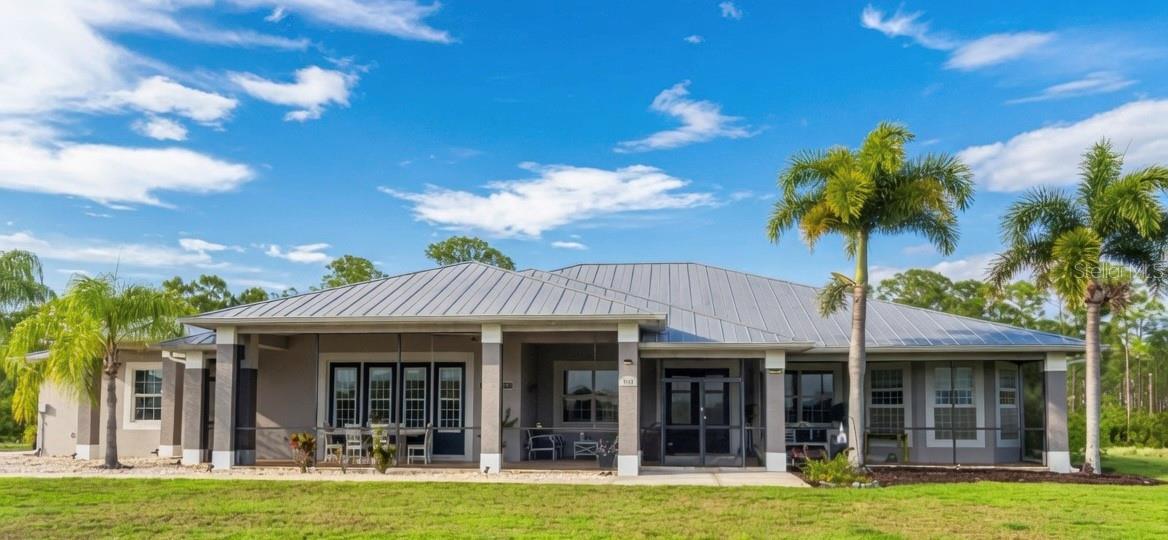 This Lakefront Estate Home with a second private residence is in the gated Lake Geraldine Community in Venice, on 3 acres with 300' frontage on a 30-acre lake, with Myakka State Forest behind. To the Wellen Park schools is 2 miles/5 minutes, on the way to dining, shopping, and the Atlanta Braves Spring Training Stadium. To Englewood Beach is 20 minutes and Venice Beach 30, US 41/ Tamiami Trail 3.3 miles by River Road, I-75 Exit 191 8.4 miles.

This Executive home is ideal for someone who entertains family, friends, and business associates. The detached guest house is perfect for parents or visitors. Both houses and well house have metal roofs. Main house is 5752 SF with 3989 SF heated, high ceilings, crown moldings, porcelain tile throughout living areas, wood plank tile in bedrooms, custom ceiling fans most rooms. 3 BDR, 3 baths, 1/2 pool bath. Foyer opens to formal living room with fireplace and disappearing sliding doors to pool. Formal dining room is open to 26' x 17' kitchen with side by side refrigerator, 75-bottle wine cooler, island 6-burner gas range, custom range hood, island sink, wood cabinetry, granite countertops, and raised counter seating for 6. Dinette seats 4 with bay window to pool and lanai. Family room is open to kitchen, has sliding door wall to outdoor kitchen, pool. Covered seating on pool deck with sliders to living room. Primary Bedroom has walk-in her/his closets. Bath has soaking tub between vanity cabinets, walk area each side to bay window walk-in/through shower, 2 handheld showers and a rain shower & a spray wall, windows view lake for Sunset. Separate water heater for Primary Suite. Outdoor shower by screened /heated saltwater pool. All new pool equipment, replumbed, auto clean, chlorinator, control in Kitchen. 36x20' pool in a Travertine deck 55x30' open & 30x21' covered. 68-foot Travertine covered and screened front porch with room for a dining table, seating area for 4 and a bench, looks over the lake for watching sunsets, and to your private dock, the only one allowed on the lake. 

Well house high volume water softener preserves twin high-pressure filters in a RO system filling the 500 gallon storage tank. DAB pump for constant flow/pressure to the homes. Water goes through carbon tank & calcium tank removing chlorine and correcting  pH. New pressure tank and switches. Irrigation controlled by wireless controller programmed by cell phone. Pump in lake provides irrigation for 12 zones covering the property. A variance reduced the cul-de-sac ROW by 10', $27K in high quality fill added to allow a wall/ gate on the front, and along the driveway opposite the garage for an additional garage/ storage building. If power goes out the generator powers the house including A/C. The lot sides & rear are fenced. 

Guest House: built 2012, 1512 SF total, 862 SF conditioned space. Propane generator w/ 250 GL tank. New AC in April. Complete renovation 2023-4: luxury vinyl floor, new kitchen cabinets, appliances, fixtures, quartz counters with waterfalls, new bath vanity/ fixtures, backlit pantry/linen & mirrored bedroom closet doors. 12x14' bedroom, 12' closet. Added 22x36' rear deck with screen enclosure to the covered deck. Living room has 2-side corner sliders opening to deck with outdoor shower & plumbed for outdoor kitchen. 150x90' fenced rear yard. Commercial hexagon Tiki bar, swings and fire table by the lake. Many large palm trees and landscape with blooming trees added to complete a back yard oasis.