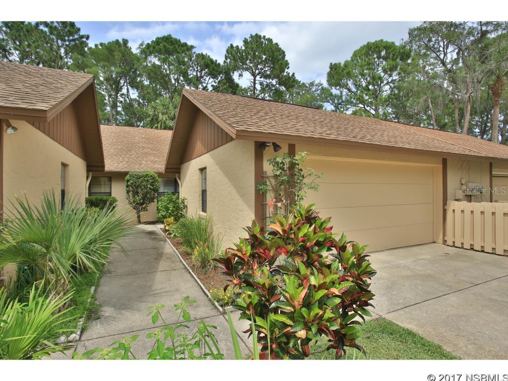 MAINTENANCE FREE LIVING!!  THIS ATTACHED HOME IS LOCATED ON A QUIET CUL-DE-SAC AND FEATURES 2 LARGE BEDROOMS, 2 BATHS, EAT IN KITCHEN, LIVING/DINING COMBO, INSIDE LAUNDRY, STONE ELECTRIC FIREPLACE THAT HEATS UP, REAL HARDWOOD FLOORS IN LIVING AREA AND MASTER BEDROOM.  TILE FLOORING IN KITCHEN, FOYER & BATH.   EAT IN KITCHEN, WASHER & DRYER. 2 CAR GARAGE.  HOA COVERS LAWN CARE, TERMITE BOND, BASIC CABLE AND EXTERIOR PAINT.   BEAUTIFUL GOLF COURSE  COMMUNITY, CLOSE TO SPEEDWAY, COLLEGES, BEACHES, SHOPPING AND RESTAURANTS.  FURNISHINGS AVAILABLE.....ALL MEASUREMENTS ARE APPROXIMATE. ;Water: City
