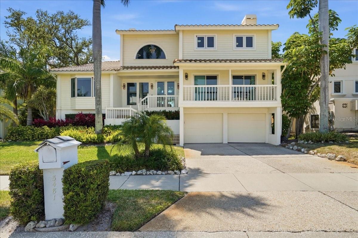 60% OWNER FINANCING AVAILABLE - Step into a private coastal sanctuary at 3481 Bayou Sound, located within one of Longboat Key’s most exclusive gated communities. Accessed through two secured gates and a guarded entrance, this residence offers a level of privacy and security rarely found.
Ideally situated just moments from Publix, and within walking distance to the marina, golf course, and premier waterfront dining, the home delivers both convenience and an elevated island lifestyle.
Ownership includes access to the Bay Isles Beach Club, offering private beach access on the Gulf of America, along with barbecue areas, tables, and shaded spaces, perfect for effortless, all-day beach enjoyment.
Inside, soaring cathedral ceilings create a dramatic, light-filled living space. The home has been thoughtfully upgraded with new flooring throughout, a fully renovated kitchen, and new hurricane impact windows and doors. The remaining front entry and garage doors will be replaced prior to closing, completing a full storm-ready envelope.
Outdoors, enjoy true waterfront living with a brand new dock and lift, providing direct access to boating right from your backyard.
A rare offering combining privacy, security, and effortless luxury in the heart of Longboat Key.