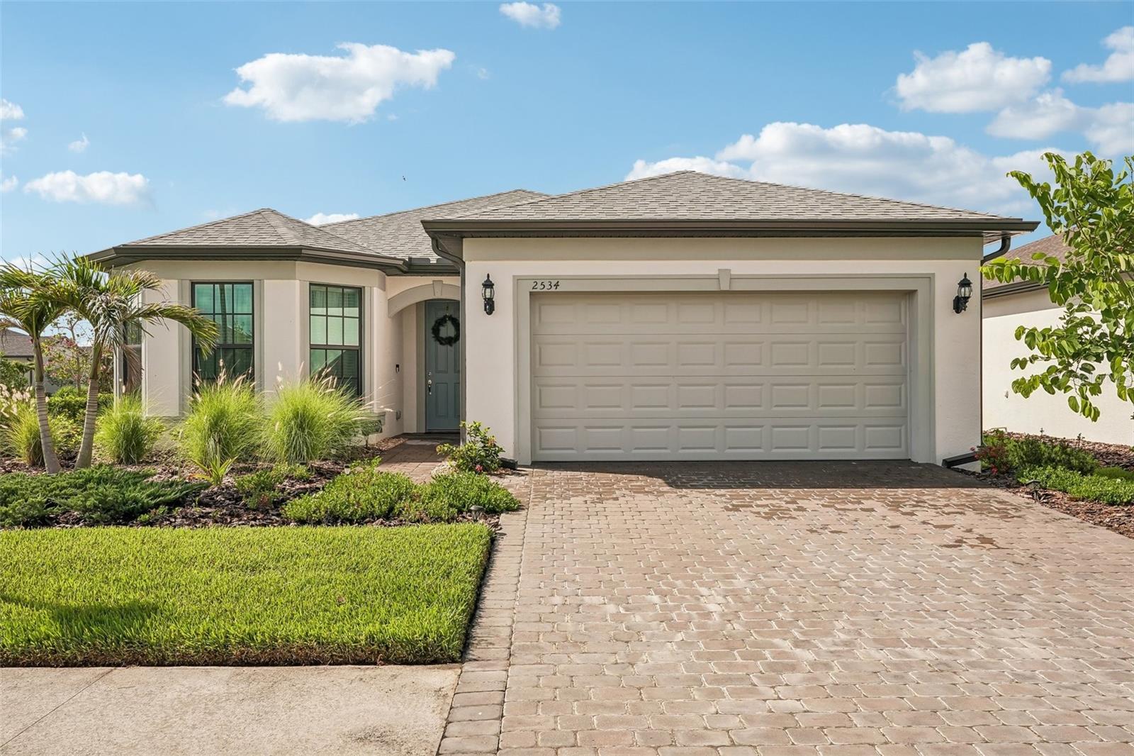 This gorgeous, move-in-ready home in Cedar Grove is officially waiting for you. It packs 3 bedrooms, 2 baths, a flexible den space, and a finished laundry room (yes, with a sink and cabinets!). The inside feels incredibly spacious with 8-foot doors and a stunning tray ceiling in the family room. When you're ready to unwind, just slide open the glass doors to your screened-in lanai. Total bonus: it features ceiling fans throughout and full hurricane impact windows and doors for absolute peace of mind. The kitchen is a chef's dream with quartz countertops and stainless steel, and the primary suite boasts a huge walk-in shower. Located in North Port’s "The Woodlands," you’ll get access to a private pool, playground, and basketball court, while being minutes away from shopping, great eats, and beautiful beaches.