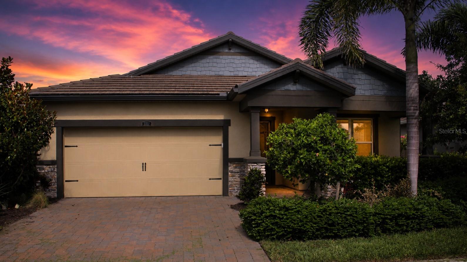 SAVE about $100 a month in your electric bill by existing solar panels and the roof is also guaranteed for twenty more years by the solar company. Welcome to 5826 Long Shore Loop, a beautifully appointed residence in the highly sought-after gated community of Sunrise Preserve in Palmer Ranch. This thoughtfully designed home offers the perfect blend of comfort, style, and Florida living, featuring an open-concept floor plan with abundant natural light and seamless indoor-outdoor flow.

The spacious great room serves as the heart of the home, connecting effortlessly to the gourmet kitchen complete with a large center island, modern cabinetry, stone countertops, stainless steel appliances, and ample storage. The dining area and living space overlook the outdoor lanai, creating an ideal setting for both everyday living and entertaining.

The owner's suite provides a private retreat with a generous walk-in closet and a well-appointed ensuite bath featuring dual vanities and a spacious walk-in shower. Additional guest bedrooms offer flexibility for visitors, a home office, or hobby space.

Step outside to your private outdoor oasis where the covered lanai and inviting pool create the perfect environment for enjoying Sarasota's year-round sunshine. Whether hosting friends, enjoying a morning coffee, or unwinding at the end of the day, the outdoor living area is designed to maximize the Florida lifestyle.

Located within Sunrise Preserve, residents enjoy resort-style amenities including a clubhouse, fitness center, community pool, pickleball courts, tennis courts, and a full calendar of social activities. Palmer Ranch's prime location places you just minutes from world-famous Siesta Key Beach, Legacy Trail, shopping, dining, golf courses, and top-rated Sarasota attractions.

This exceptional home offers the ideal combination of luxury, convenience, and maintenance-free living in one of Sarasota's premier communities.