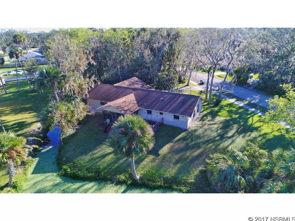 Must See this lovely, 3/2 split floor plan WATERFRONT home in peaceful Florida Shores.  This spacious home is complete with a Florida room and back porch to take in the beautiful water views. 2 car garage. AS-is- has been inspected. ;Water: City