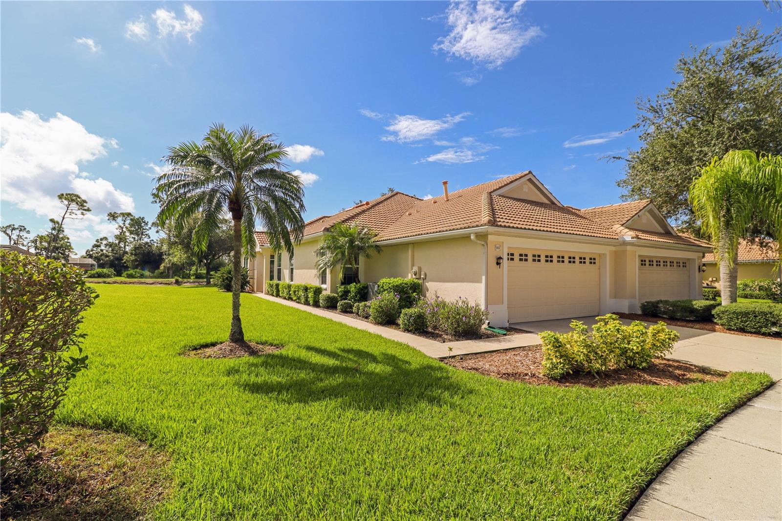 MOVE IN READY! NEW ROOF 2026. A Golf course gated community living at its best,  Located in the Heron Creek Golf & Country Club.  This stunning Villa offers an Exceptional Water View and is loaded with upgrades . All the appliances are Hi End and in excellent condition .  Everything is updated from the kitchen to the flooring. Has both recessed lighting and natural lighting. Very private views with the extra lot on the corner. Golf Memberships include  a Arthur Hills 27-hole championship golf course, Resort style swimming pool and spa, Sports facilities, lighted courts and a Beautiful clubhouse for casual or elegant dining.