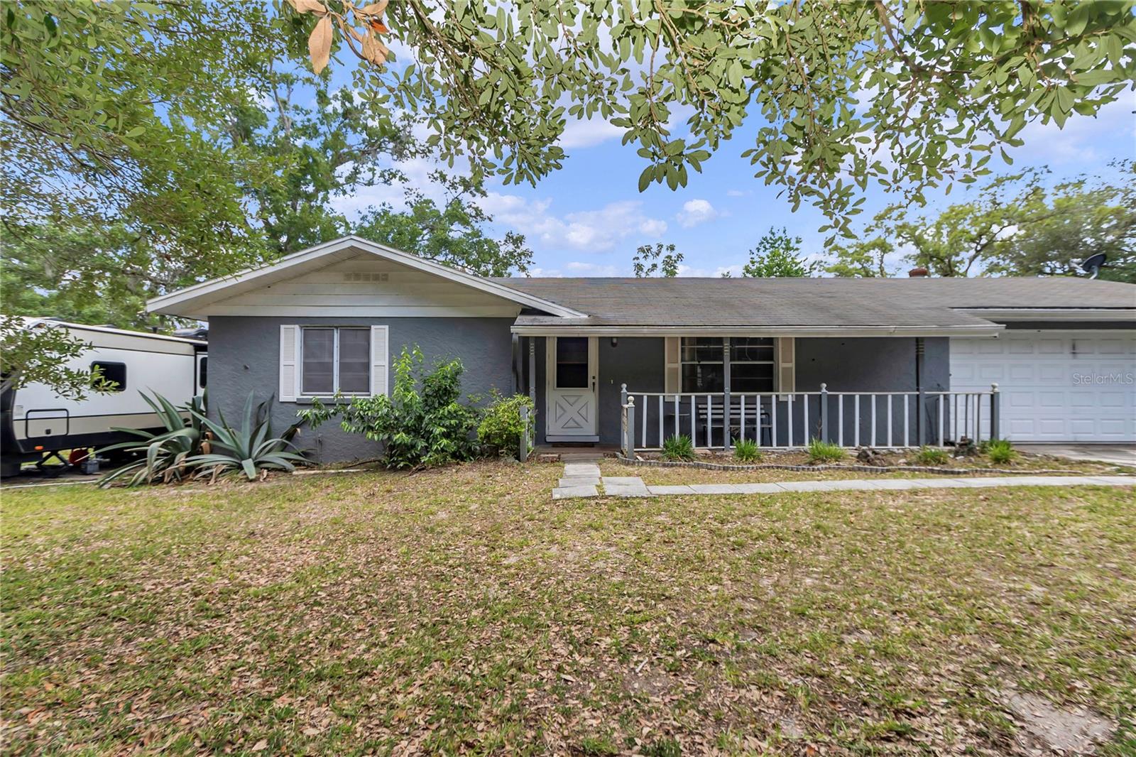 Motivated Seller!!!! Charming 2/2 home in Woods and Lakes Subdivision, Ocala National Forest. Backs up to lake with patio overlooking water. RV pad with electricity. Nearly surrounded by 500,000 acres of forest, 600 lakes & 2 rivers. Community lakes for fishing/kayaking. Near Juniper, Silver Glen, Salt & Silver Springs. Water sports, hiking, ATV trails. 1hr to Daytona Beach, minutes to Ocala & The Villages.