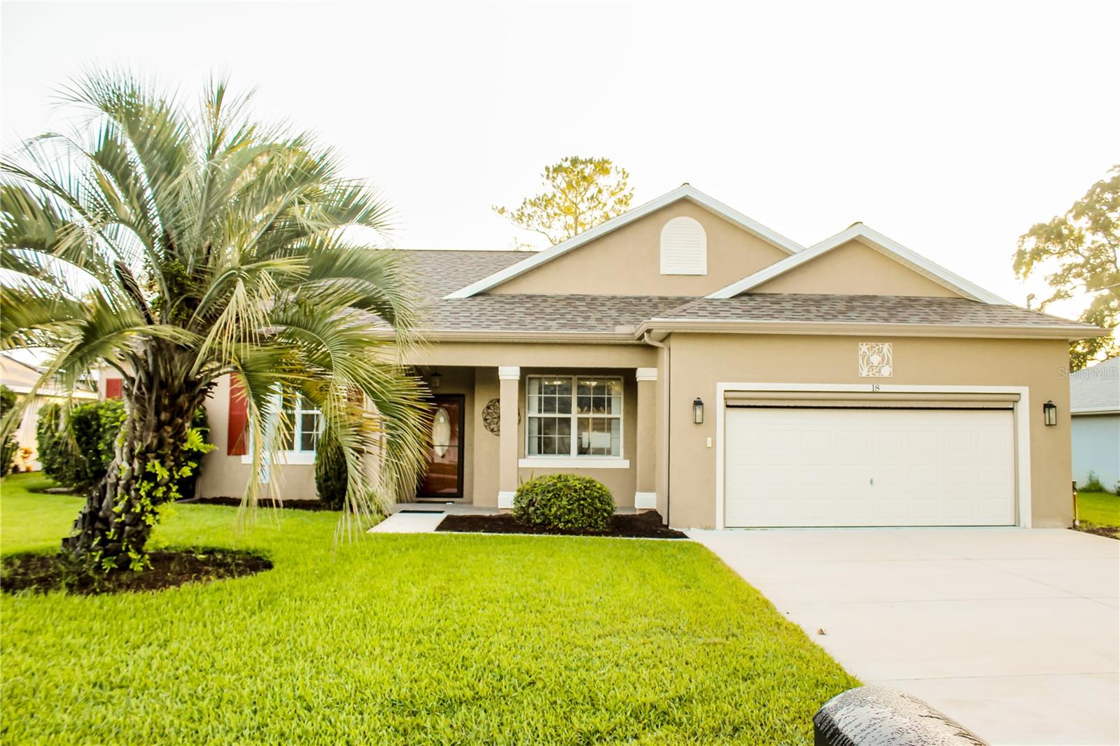 Live the Florida lifestyle in this well maintained move in ready home in desirable Pine Lakes Community just 2 blocks from Pine Lakes Golf Club.  Open Layout 3 bedrooms, 2 baths, and an extra bonus room for a den or home office.  Private screened in pool and a lanai for relaxing or hosting friends.  Spacious master suite with tray ceiling, walk out door to lanai and pool, walk in closet, pocket doors to closet and bathroom, large garden tub and separate shower.  The high ceiling in the living room flows into a custom Kraft Made kitchen featuring self close drawers and extra cabinets in breakfast area perfect for cooking and entertaining.  Many updates over the years: Pool 12 X 25 was done in Sep 2014, HVAC in Dec 2018 and motor replaced in 2025, Hot Water Heater in May 2024, roof panels in pool enclosure replaced in May 2023, gutters, and one piece garage screen Sep 2020, well added to the irrigation system in Dec 2021, driveway repaved and extended in Jan 2023, exterior house painted in Sep 2020, re-roof done in Nov 2020, pool pump replaced in May 2023, GE washer with 5 years warranty in Apr 2024, new Kohler toilet replaced in guest bath in May 2026, new GE range Feb 2026, GE microwave Feb 2026, fairly new water filtration system and new storm door Jun 2026. Beautiful lawn maintained by Massey. All listed room sizes are approximate.  Great location just minutes away from shopping, parks, walking trails, and beaches.  Easy access to I-95 and SR 1.  A short drive to Flagler Beach, Palm Coast Beaches, and about 40 minutes to Daytona and St Augustine Beaches.  Call today to schedule a showing today.