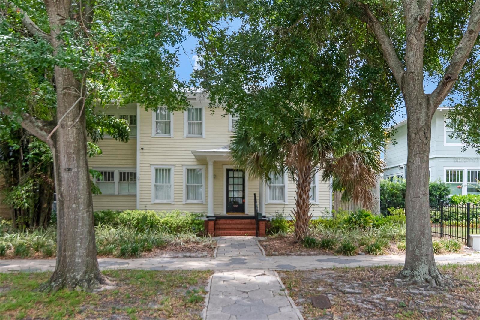 Fantastic and rare opportunity to rent this This exquisite Old NE colonial home with detached garage with guest house above the garage. The home features an impressive floor plan with a grand living room enhanced by a gas fireplace, tall ceilings, custom bookcase, original picture molding, and the beautiful heart of pine flooring found throughout. A formal dining area with crown molding is centrally located and adjacent to the stylishly appointed kitchen with walk in pantry, and French doors leading to the oversized deck. Opposite, an enchanting Florida sunroom allows seamless flow to the outside entertaining masterpiece of open terrace that overlooks lush landscaping and a perfectly planned outdoor space large enough to accommodate a swimming pool. The second floor features a large master suite, his and her closets, and a sunlit bonus room that accesses the charming master bath. 2 guest bedrooms with full bath add to this ideal floor plan. A one bedroom renovated in-law apartment is located above the garage and has its own private courtyard. Walking distance to downtown, easy access to I-275, Tampa International Airport, and Gulf Beaches, this home is a must for a family wanting an historic area close to downtown.