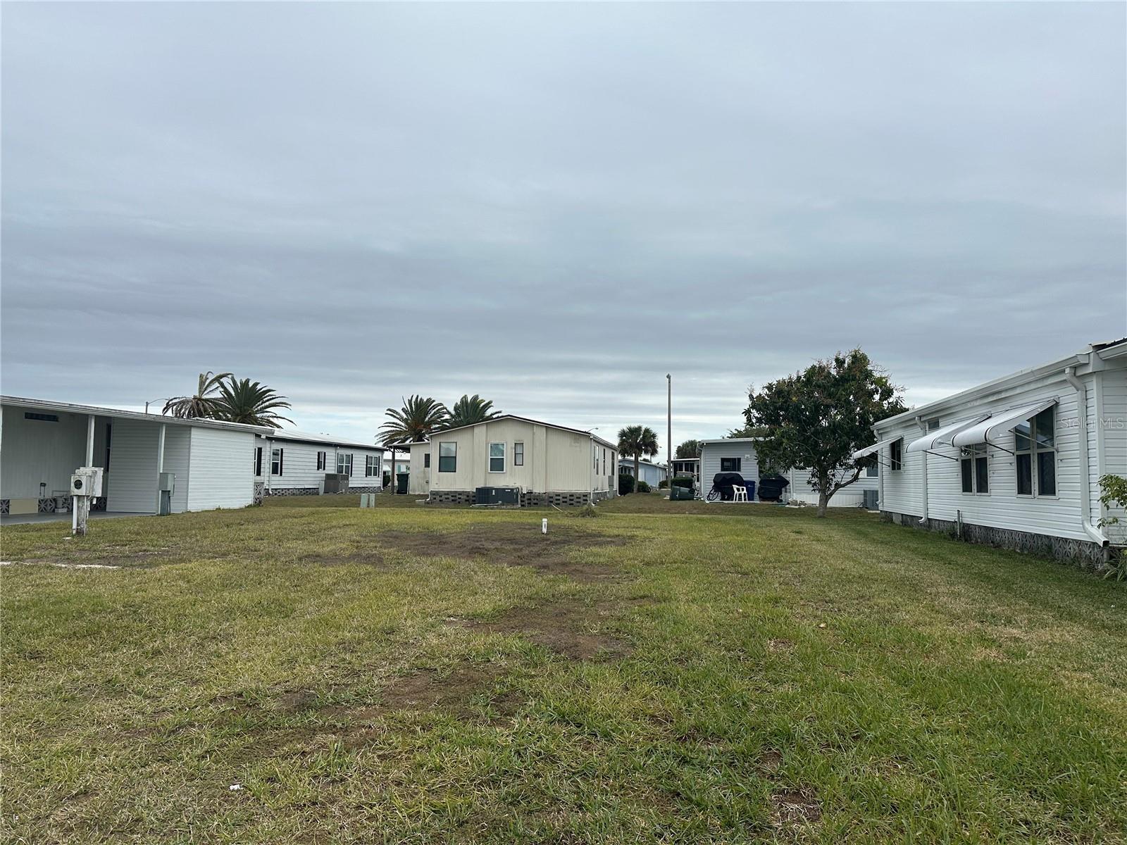 Build your Florida lifestyle on this vacant interior lot located in the desirable 55+ community of Harbor Cove in North Port, Florida. This homesite offers a great opportunity for a new manufactured home in a well-established, friendly neighborhood known for its relaxed coastal vibe. Harbor Cove features attractive community amenities and an active social calendar, all in a convenient location close to shopping, dining, medical facilities, and the Gulf beaches. Whether you’re planning a seasonal retreat or a full-time residence, this lot provides a blank canvas to create your ideal Florida home.