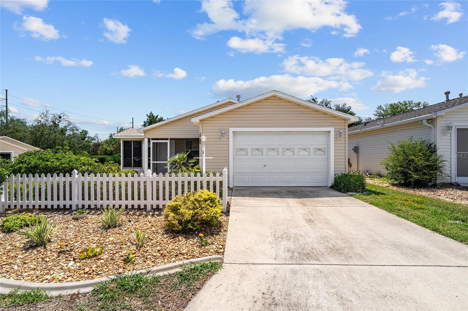 ~$2,000 PRICE REDUCTION~ ~NO BOND~ ~2019 ROOF~ ~2023 HVAC~ ~2025 HOT WATER HEATER~ ~FURNITURE OPTIONAL~ ~EZGO ELECTRIC GOLF CART INCLUDED~
Welcome to this charming COLONY Patio Villa in the Village of SPRINGDALE, IVYSTONE VILLAS, offering a wonderful combination of privacy and low-maintenance living in The Villages. Step inside to HIGH VAULTED ceilings and an OPEN LAYOUT with TILE flooring throughout the entryway, living room, kitchen, and dining area. The living room is bright and inviting with a ceiling fan, while the kitchen offers laminate countertops, a SOLAR TUBE for natural light, CLOSET PANTRY, and a cozy EAT-IN AREA. The spacious primary suite features LUXURY VINYL flooring, VAULTED ceilings, and a WALK-IN CLOSET. The primary bath includes CERAMIC tile flooring, a walk-in shower, and laminate countertops.
Guests will enjoy the comfortable 2nd bedroom with LUXURY VINYL flooring, ceiling fan, and built-in closet. The guest bath features CERAMIC tile flooring, a linen closet, fiberglass tub/shower combo, and laminate countertops. The laundry area is conveniently located off the kitchen in the garage and includes shelving for additional storage. Relax year-round in the ACRYLIC-ENCLOSED LANAI located on the side of the home for ADDITIONAL PRIVACY with blinds and a ceiling fan. There is room for expansion if desired, offering endless possibilities for outdoor living or additional entertaining space.
This Colony villa is the perfect opportunity to enjoy comfortable Florida living with privacy, updates, and room to grow in a convenient Village of Springdale location.
Close to Nancy Lopez Country Club, Glenview Country Club, Mulberry Grove Rec Center, First Responders Rec Center and numerous executive golf courses. Shopping, dining & medical are also nearby at the Mulberry Grove Shopping Center.