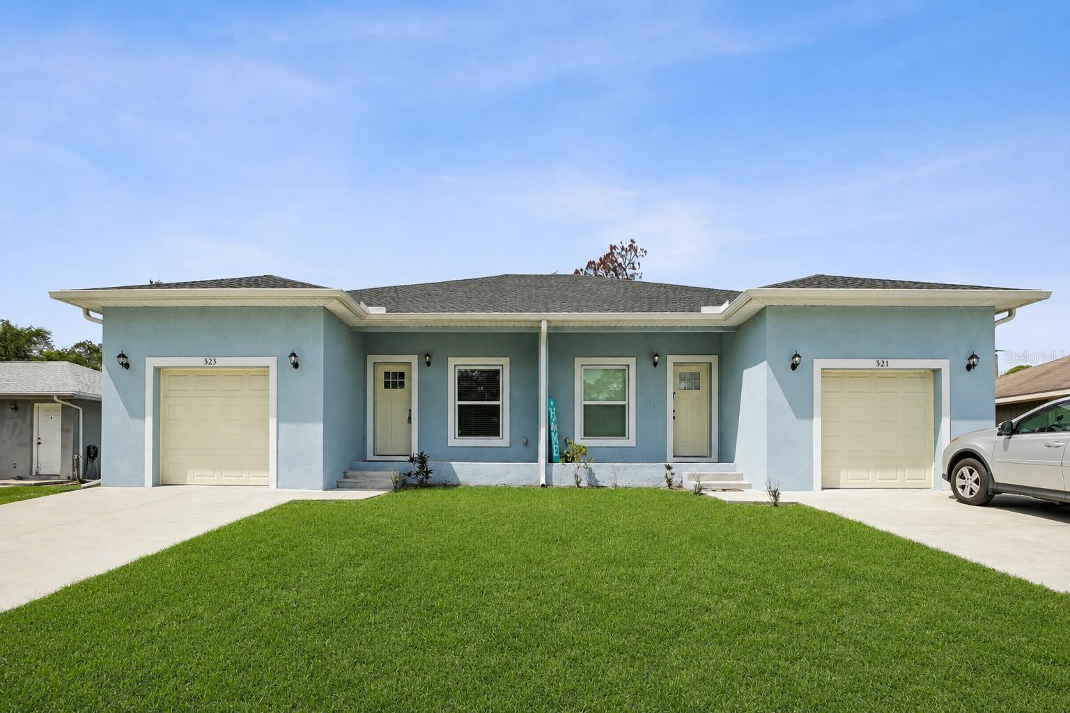 • Beautiful Modern Duplex (3BR/2BA in each unit) in North Port — Built 2024, One Unit Rented 
• City water • No HOA • Flood Zone X (no flood insurance required) 
• Convenient location near shopping, restaurants, schools, medical facilities, and major roadways
 • Minutes to beaches, boating, fishing, golf, parks, waterfront dining, and entertainment 
• Open concept layout, high ceilings, impact resistant windows, attached garage 
• Walk in master closets, interior laundry rooms 
• Granite countertops, shaker cabinetry, stainless steel appliances

This beautifully finished 2024 built duplex is ideally located in the North Port area near the Murdock Circle shopping district, combining modern design, convenience, and strong rental appeal. Spanning 2,400 sq ft, each side features a 3BR / 2BA open concept layout with abundant natural light.

Both units include a private patio, single car garage, and a wide concrete driveway for additional parking. Interior features include tall ceilings, impact resistant windows and sliders, and luxury vinyl plank flooring, creating a bright, modern, and durable living environment.

The kitchens are equipped with granite countertops, soft close shaker cabinetry, and stainless steel appliances. The spa style bathrooms showcase elegant tile work, upgraded fixtures, and thoughtful finishes. Each unit also includes an interior laundry room and walk in master closets for added convenience.

This property is well suited for investors seeking a strong income opportunity or for an owner occupant who prefers to live in one unit while generating rental income from the other. One unit is already rented, and the other is move in ready.

Positioned close to beaches, boating, fishing, golf courses, parks, waterfront tiki bars, and live entertainment, this duplex provides access to the best of Southwest Florida living. It presents a compelling opportunity for those seeking a modern home or an income producing asset in a desirable location. Some photos have been virtually rendered.