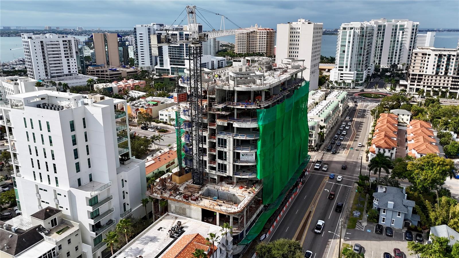Pre-Construction. To be built. Discover a rare opportunity at The Edge Sarasota—where boutique living meets vibrant city life. Residence A is a premier 3-bedroom, 3-bathroom corner residence offering over 3,200 square feet of open, modern living in one of Sarasota’s most in-demand downtown locations. From the 6th floor, this light-filled residence wraps the northwest side of the building offers exceptional natural light with floor-to-ceiling walls of glass. Step out onto your generous wraparound terrace and watch the sunset over the city.
Designed to be as unique as you, the home features a great room and separate living room that connects to a chef’s kitchen with Italian cabinetry, Wolf and Sub-Zero appliances including a gas cooktop, a large island with waterfall edge and a butler’s pantry for easy entertaining. A thoughtfully designed owners’ suite provides a true retreat with a gracious foyer, midnight bar, walk-in closet and en suite bathroom featuring dual vanities, private water closets, glass enclosed shower and soaking tub.  
Beyond your residence, enjoy a curated collection of luxury amenities including a resort-style pool deck with hot and cold plunge pools, cabanas and two outdoor kitchens. The owners’ club focuses on wellness and entertainment with a fully equipped fitness center complete with a yoga room and infrared sauna. Two treatments rooms afford plenty of space for your personal massage therapist or a physical therapy session. The social room includes a lounge, bar, game room and catering kitchen. For more intimate gatherings, reserve the private dining room featuring resident wine lockers and a separate bar area. 
The building’s boutique size—only 27 residences—creates a community feel in the heart of Sarasota’s vibrant Arts District.
Walk to acclaimed restaurants, galleries, boutiques, and the Bayfront, embracing a lifestyle that combines culture, convenience, and sophistication. Construction is progressing with limited opportunities to customize your finishes—secure your place at The Edge today and invest in a rare downtown Sarasota address with lasting appeal. Images shown are artist renderings intended to illustrate the interior finishes and design concepts for this community.