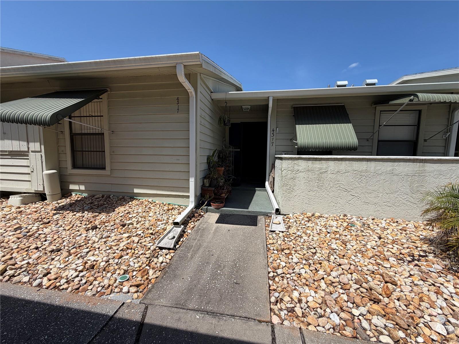 RIVER SIDE VILLAGE CONDO - Residential