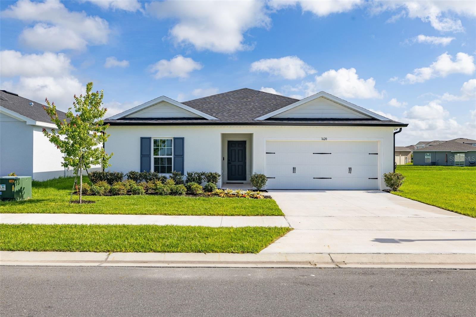 \Welcome to Sumter Villas, where small-town charm meets modern convenience.
This move-in-ready Ryan Homes Mahogany floor plan is in a desirable community
with low HOA fees and no CDD, offering exceptional value and an easy Florida
lifestyle. Set on a PREMIUM HOMESITE with no rear or neighbors to the right, this
beautifully maintained one-story home features 3 bedrooms, 2 bathrooms, and an
open-concept layout ideal for everyday living and entertaining. The gourmet kitchen
serves as the heart of the home, featuring a large center island, abundant
cabinetry, and all included appliances. The spacious great room opens to a covered,
sun protective screened lanai, creating a seamless indoor-outdoor living area. The
current owner has also added rain gutters and a fully fenced backyard. The private
owner suite includes a spacious walk-in closet and an en-suite bath with a walk-in
shower. Two additional bedrooms and a full guest bath offers flexibility for family,
guests, or a home office. Residents enjoy community amenities such as a resort-
style pool, cabana, and more than three acres of green space all in a peaceful
neighborhood setting. Outdoor enthusiasts will appreciate nearby Lake Griffin State
Park, which offers fishing, boating, kayaking, and nature trails. The Villages,
shopping, dining, and everyday conveniences are just 10 minutes away. I-75 and
the Florida Turnpike are short drives away and are conduits to Orlando, Tampa,
and Gainesville. If you’re looking for a nearly new home with premium lot privacy,
modern finishes, and an unbeatable location, this one is not to be missed.