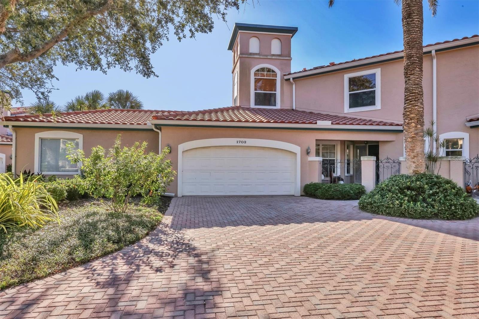 Welcome to carefree living in The Landings. This beautifully remodeled townhome makes carefree living an absolute dream! Not an inch has gone untouched, showcasing modern luxury finishes. Whether you're looking to winter in Sarasota or enjoy all that The Landings Racquet Club has to offer all year long, you are sure to relish coming home. The first-floor primary bedroom is very spacious, with an equally comfortable en suite and custom walk-in closet. The large back lanai features perfect privacy. There is a loft or family room upstairs, just outside the additional two bedrooms; perfect for an office, playroom, or sitting area. The neighborhood offers a 24-hr manned security gate, a world-class tennis and pickleball facility, pool, fitness center, and clubhouse. You'll never need to leave! But when you choose to venture out, popular restaurants and shopping are just outside the gates!