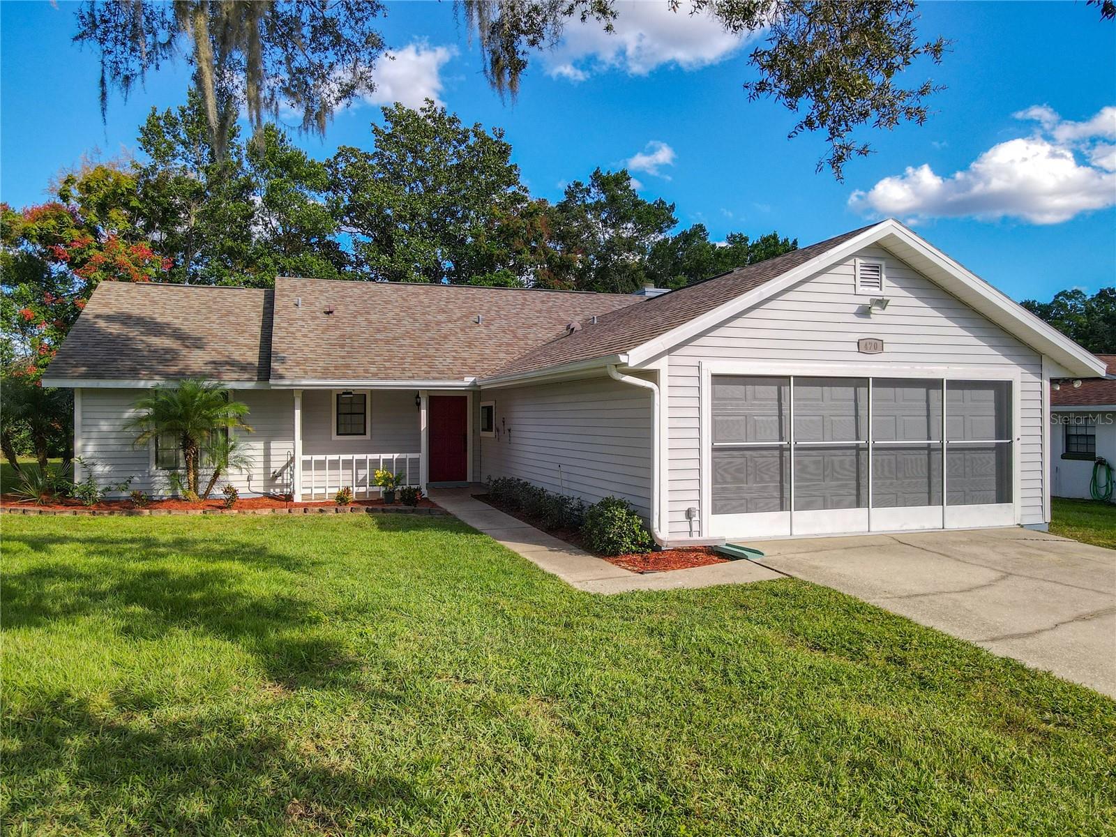 Welcome Home! This 3 bedroom/2 bath Orange City gem is the perfect location nested on a quiet cul-de-sac less than 2 miles from Blue Springs State Park. This home boasts plenty of updates including fresh paint both inside and out, new garage door, bathroom vanities & fixtues along with updated plumbing (2023). Roof and HVAC are 2018, Hot Water Heater is 2017. The kitchen features stainless appliances, an island and plenty of space for dining. You'll find newer laminate flooring and tile throughout. The brick fireplace with new electric insert adds to the ambience of this bright and airy home. This property is your serene oasis, situated within an hour of Disney Land less than hour to Famous Beaches! Schedule your showing & enjoy the laidback Florida lifestyle.