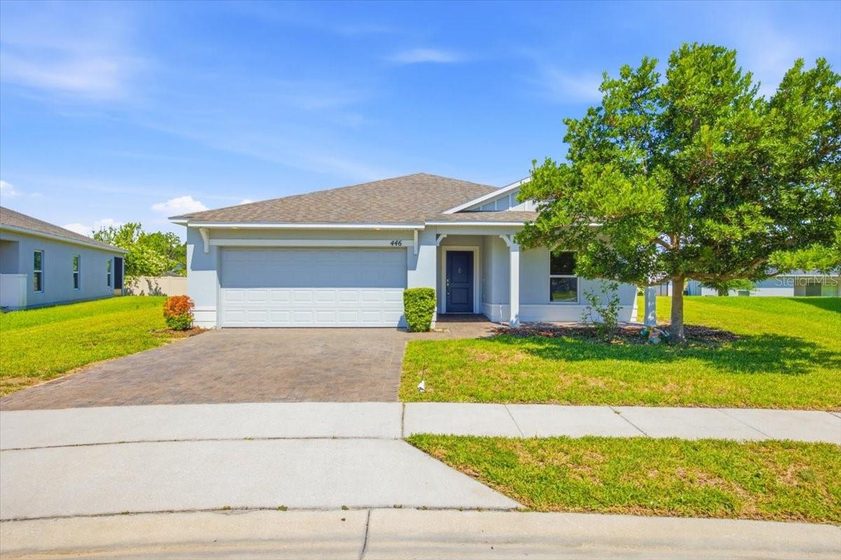 Move right into this beautifully updated 4-bedroom, 3-bath home in Davenport, FL offering modern finishes and an exceptionally spacious open layout.  This spacious one-story home features brand-new laminate flooring throughout, creating a bright and modern feel. The oversized living and dining areas provide plenty of room for everyday living and entertaining. The kitchen offers abundant cabinet space, a large center island and stainless steel appliances.  Ceiling fans have been installed for added comfort throughout the home. A full laundry room with washer and dryer is included, along with a 2-car garage. Ideally situated directly across from the community pool and playground, residents can enjoy convenient access to neighborhood amenities. Located with easy access to US-27, I-4, shopping, restaurants, schools, and Central Florida's major attractions, this move-in ready home offers comfort, space, and convenience in one exceptional rental opportunity. Renters Insurance required. One small pet allowed, pet fee applies.