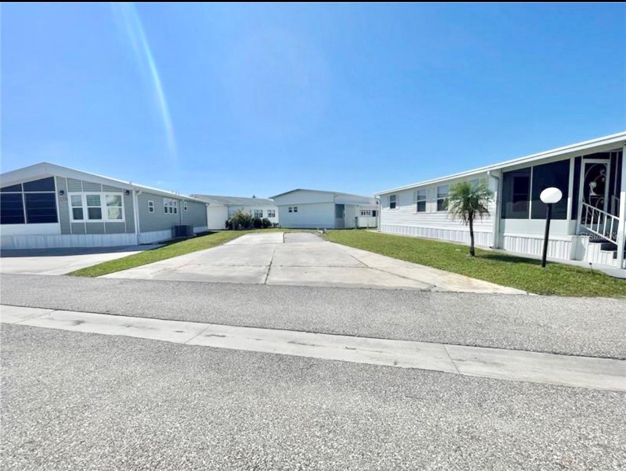 Welcome to the Gulf Of Manatee! Rare lot in Sugar Creek Country Club! Park is gated  55 + Community has 2 swimming pools, tennis courts, clubhouse with gym  &  pool tables, library and many scheduled activities . Lot can have a Permanent park model mobile home installed or also be used for RVs. HOA fees include yard service, water, sewer, garbage, basic cable, internet and all the activities in the park. CONSUMERS SHALL EXERCISE DUE-DILIGENCE.