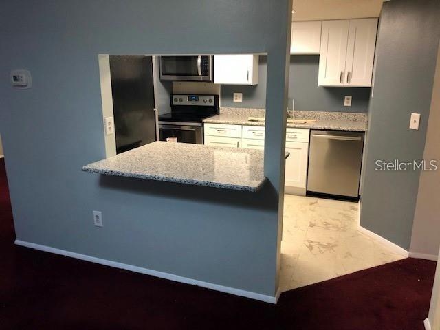 GARDENS OF FOREST LAKES CONDO THE - Residential