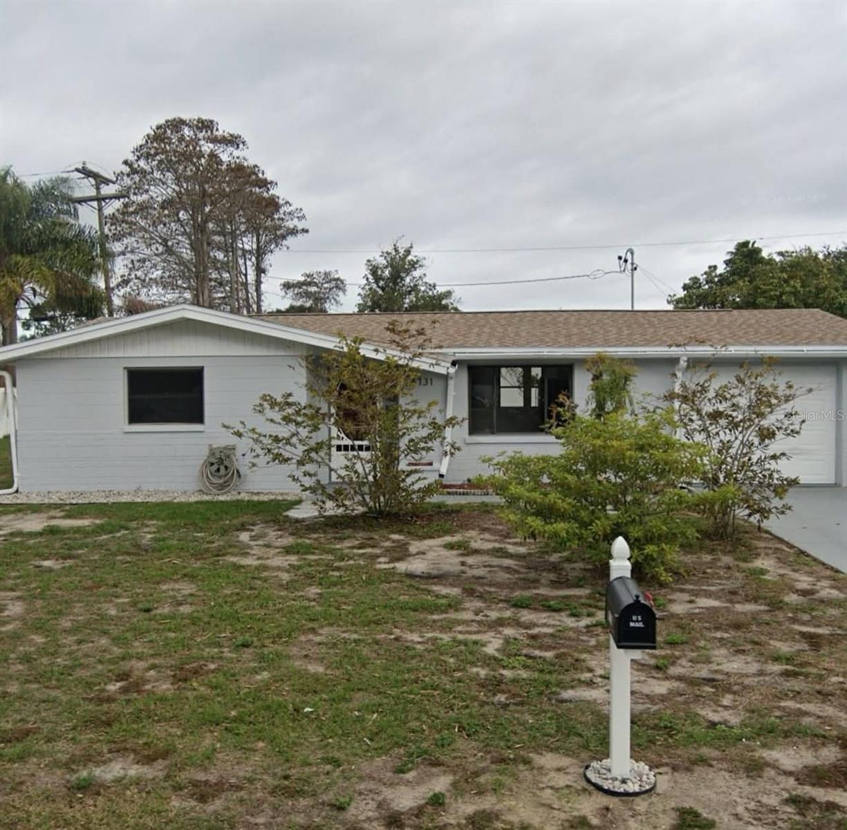 Property situated on  Oversized corner lot, the roof is 2016, NO sinkhole, No HOA, NO CDD, this two bedroom, one bathroom home, has been freshly painted with vinyl floors perfect for its new owner. Step into the front door and enter the family room and continue straight ahead into the update kitchen contains, fresh back-splash , . To the right notice the extra space , florida room which can be used as a den or perfect for office space. To the left of the family room , 2 bedroom and a bathroom  . Conveniently located off of Hwy 19 ,lots of shopping, grocery stores, hospitals, doctor offices, restaurants, and 2 major airport . 30 minutes from famous clearwater beach , honeymoon island and Tarpon Springs Sponge Docks , make this location perfect for you new home .