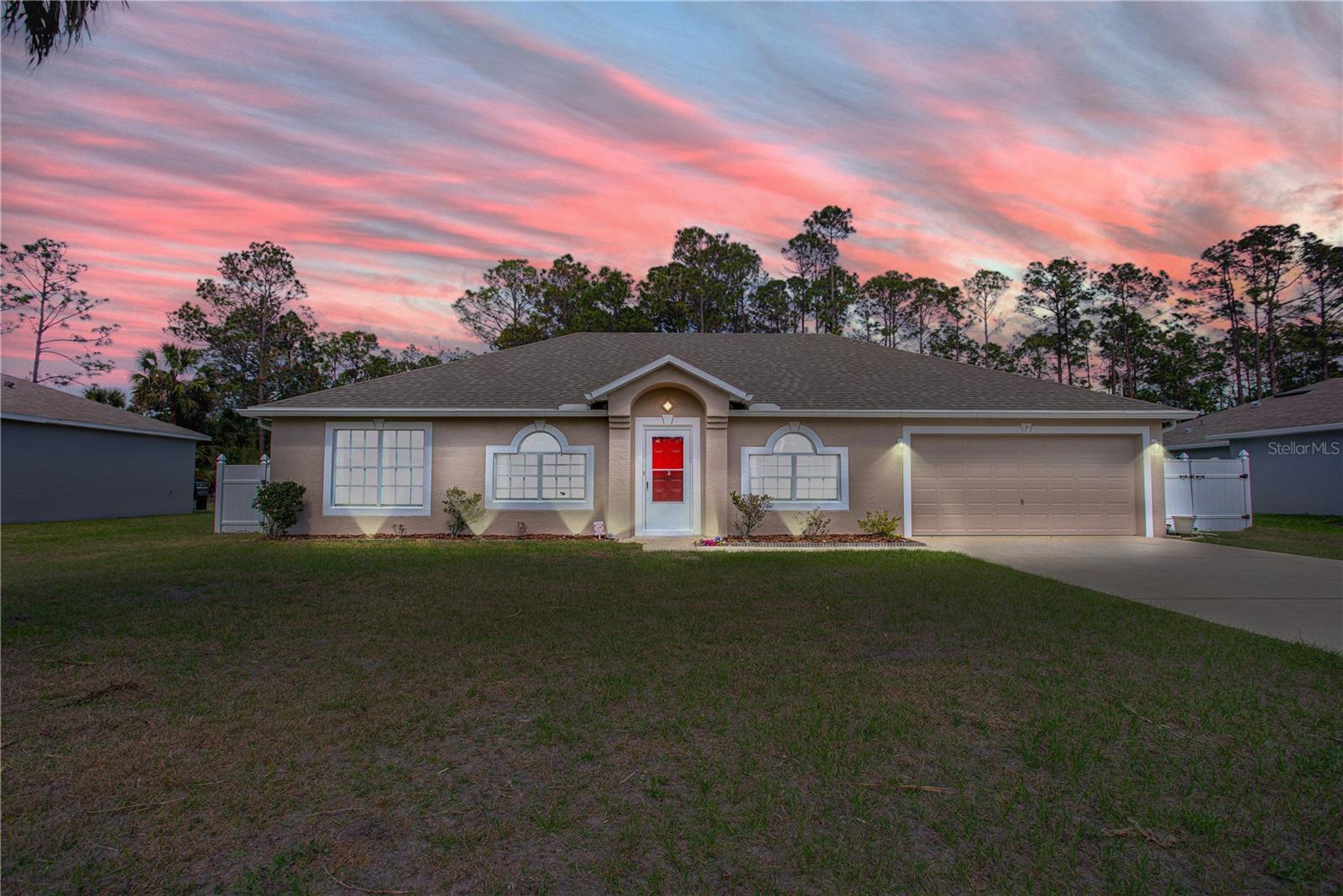 Virtually Staged. Move-in ready and thoughtfully updated, this spacious Seminole Woods home offers exceptional value with a brand-new HVAC system (2/2026), newer roof (12/2023) fresh interior paint throughout, updated fixtures, refreshed landscaping, and a beautifully updated bathroom vanity. Offering over 2,200 sq. ft., the split floor plan features generous living and dining areas, a spacious kitchen with abundant cabinetry, and a large primary suite with dual walk-in closets and an ensuite bath. The oversized backyard offers room to entertain, garden, or add a future pool. Conveniently located near Town Center shopping, schools, parks, medical facilities, I-95, and Flagler's beautiful beaches. With major updates already completed, this home is truly move-in ready and an excellent opportunity for a primary residence, seasonal getaway, or investment property. Schedule your private showing today!