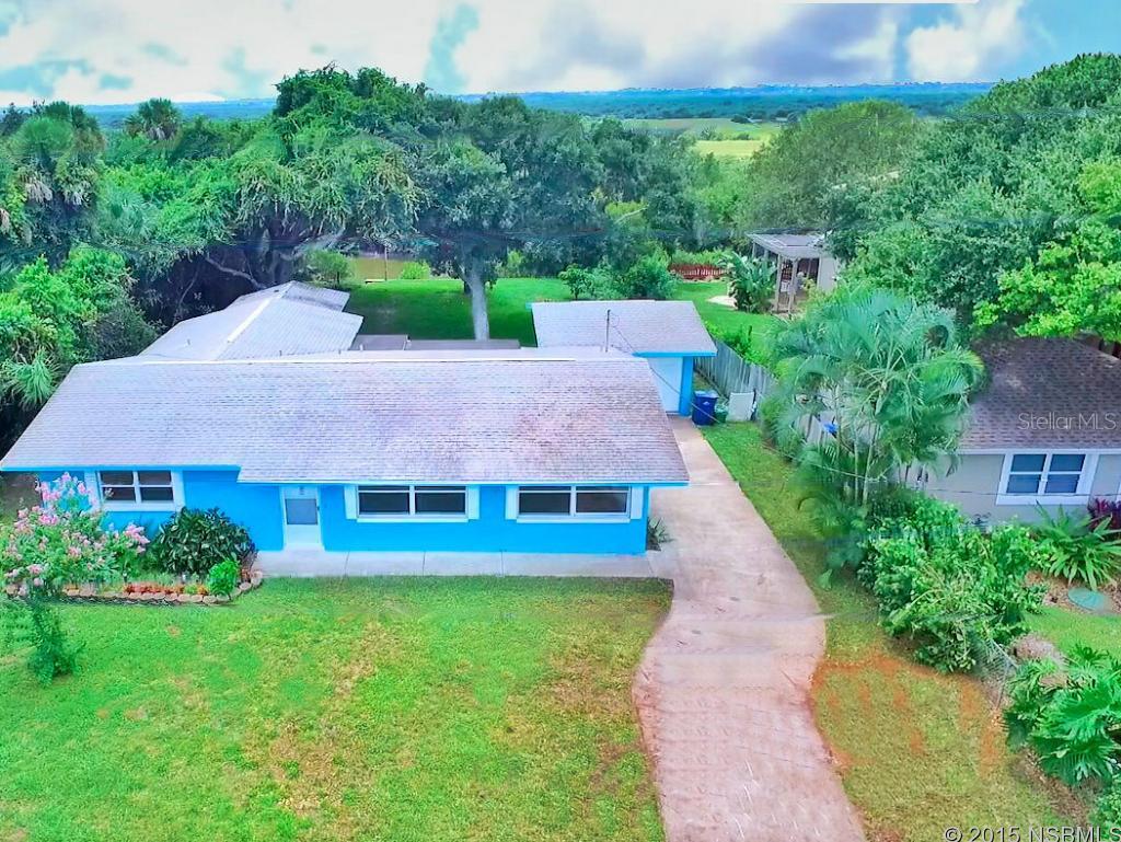 This charming riverfront beach-side home will steal your heart away with its inviting wood flooring to its historic backyard oaks draping elegantly towards the peaceful riverscape. Its nestled next to a native preserve area perfect for relaxation and privacy.  4448 Saxon is remarkable being both on the river yet a short walk to the ocean on the Island of NSB!!!  Whether its fishing, paddle boarding, surfing, or lounging at the beach, you got it all here at your new beach-side abode. ;Water: City