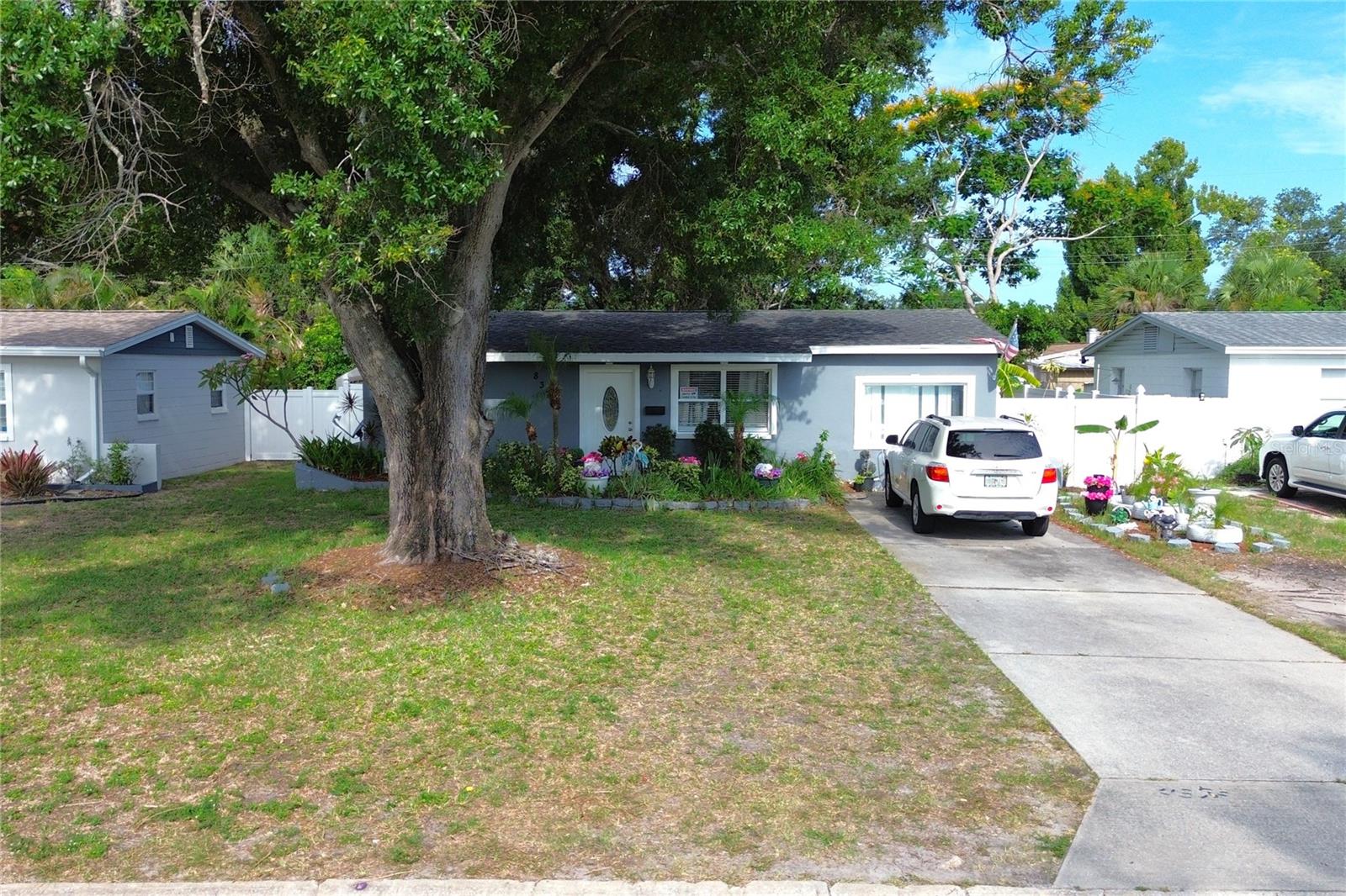 BEAUTIFUL FIRST HOME IN HARMONY HEIGHTS! ROOF 2019, AC 2011. This 3-bedroom, 2-bathroom home is conveniently located near beaches, shopping, dining, and close to the elementary schools. The home offers great curb appeal with a large front yard and a beautiful tree that provides incomparable shade. As soon as you enter, you’ll see the spacious living room with laminate flooring, and at the end of the room is the kitchen/dining combo with a pantry. The kitchen features a modern backsplash throughout, granite countertops, and self-closing cabinet drawers and doors in a beautiful natural wood color. Off the kitchen/dining area is access to the enclosed laundry room, which leads to the vinyl-fenced, large, flat backyard—perfect for pets to run around. Off the living room to the right is the large master bedroom with its own master bathroom, and to the left is the newly remodeled bathroom with tile up to the ceiling in the shower, along with a newer vanity and toilet. From the hallway, you’ll find the two additional bedrooms with ceramic tile flooring. Come and see this beauty! The home needs some cosmetic repairs and has been priced accurately.