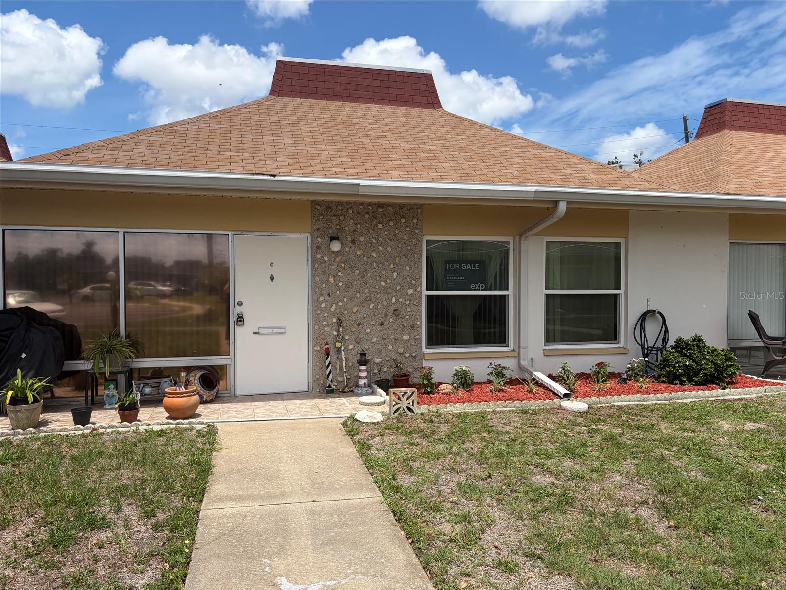 Hello! Welcome to this beautiful 2 -bedroom 1.5-bathroom condo. In the heart of Tahitians Gardens Condominium Community (55+) in Holiday, FL.  This home is fully furnished, has luxury vinyl wood floors throughout and tile in the bathrooms, kitchen and entry way. The living /kitchen is an open concept with big, beautiful windows and has a screen front door for plenty of lighting. Primary bedroom is spacious with a Walkin closet and half bath. The main bathroom has a vanity with plenty of space as well as tub shower combo with handicap railing and build in bench. 
There is a brand-new stove as well as A.C unit and smart thermostat and has a tankless water heater. 
Tahitian Gardens condominium community is around a series of lakes with a Tahitian theme. A low maintenance lifestyle with amenities like a heated pool, shuffleboard, clubhouse, recreation hall, laundry area, organized activities and scenic lakes 
Located along US-19 and close to shopping, dining and beaches.