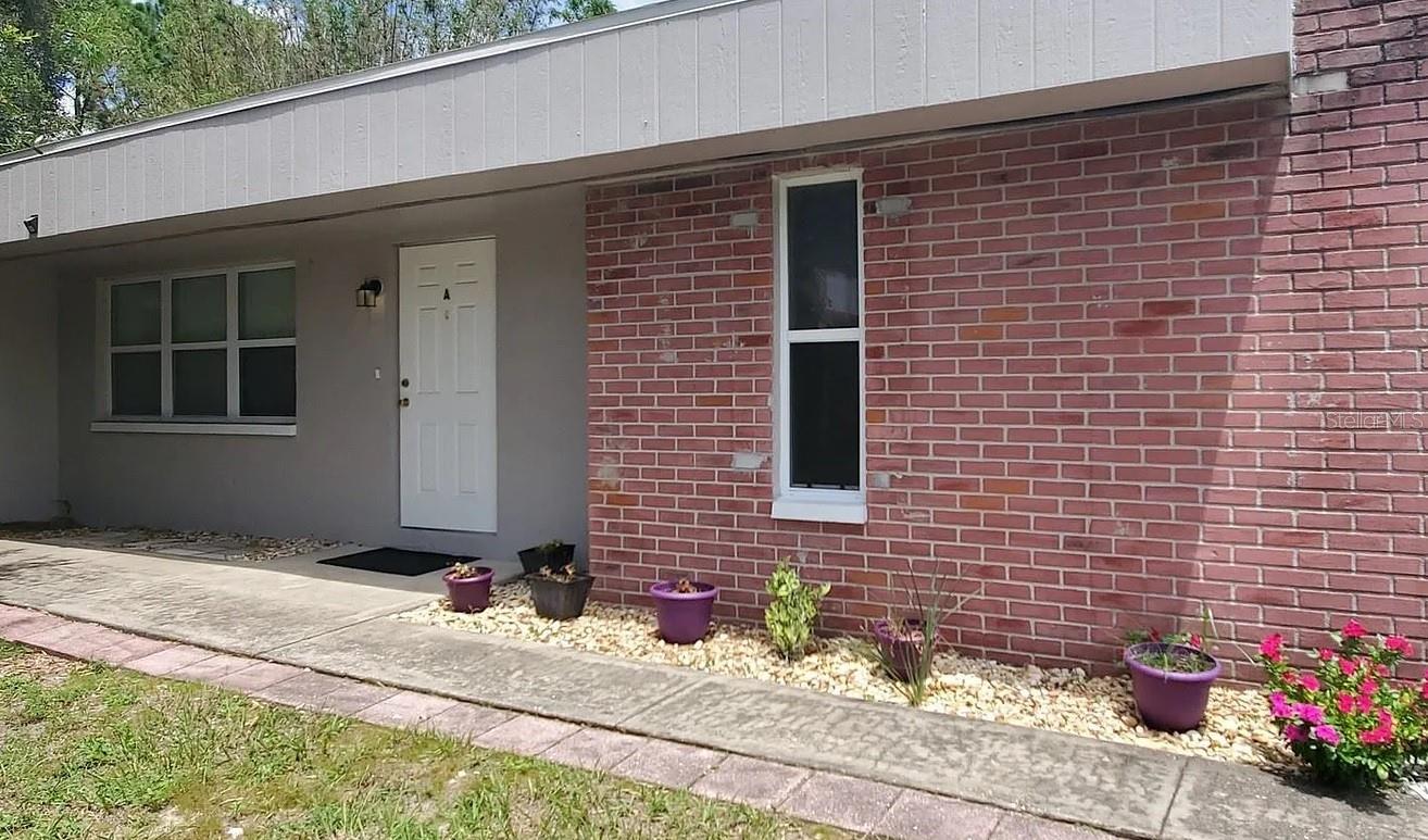 Excellent income-producing duplex investment opportunity! This well-maintained property features two separately occupied units: a spacious 2-bedroom, 1-bath unit and a 1-bedroom, 1-bath unit, providing immediate rental income.

Each unit offers private outdoor living areas with separate side and backyard spaces, enhancing tenant appeal and privacy. The 2-bedroom unit features a screened patio, elegant French doors leading to an additional backyard porch, and a generous fenced yard complete with a storage shed for added convenience.

Tile flooring throughout both units provides durability, low maintenance, and long-term value for investors. Whether you're looking to expand your portfolio or begin investing in multifamily real estate, this property offers strong rental potential and attractive tenant amenities. Conveniently located near shopping, dining, major roadways, and local attractions.

Don't miss this opportunity to own a turnkey multifamily property with immediate cash flow. Schedule your showing today!