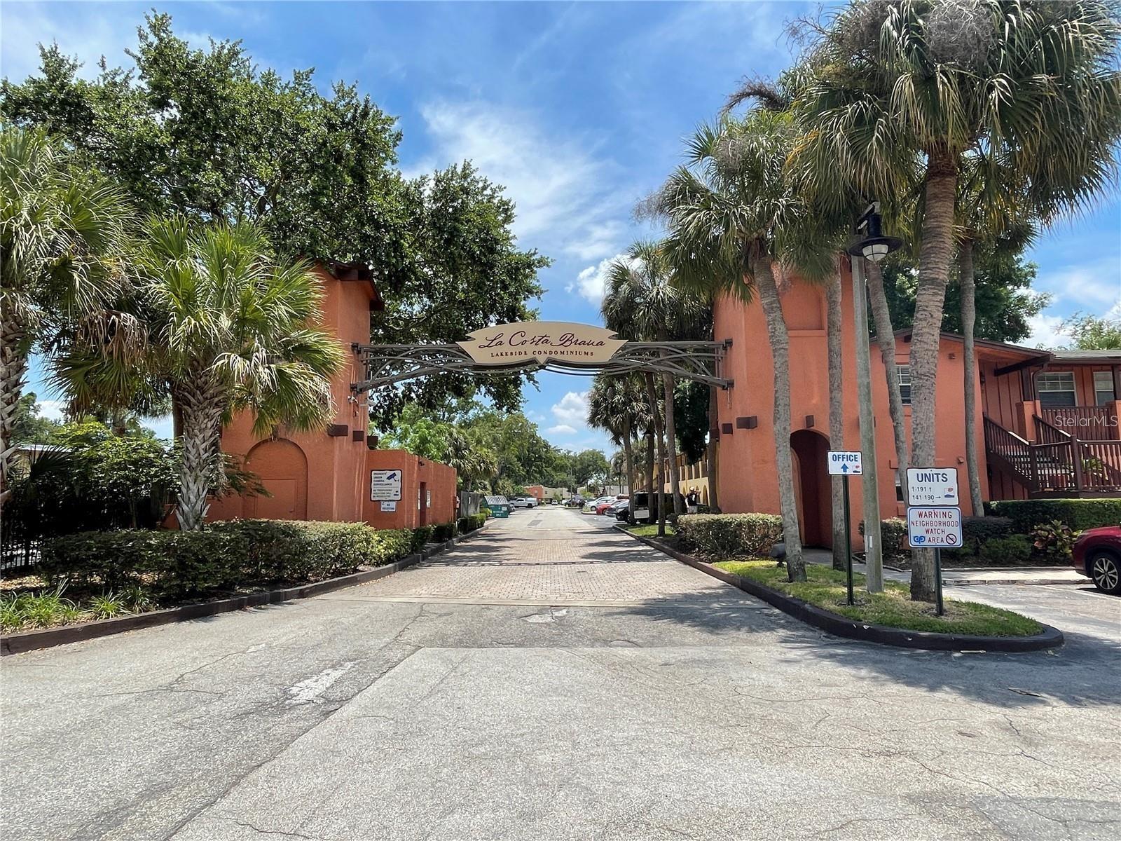 Welcome to La Costa Brava! First floor condo with open floor plan, screened patio, fitness center, lake views, and 2 community pools. Laminate floors in the living room, dining room, and bedroom; tile in the kitchen and bath.