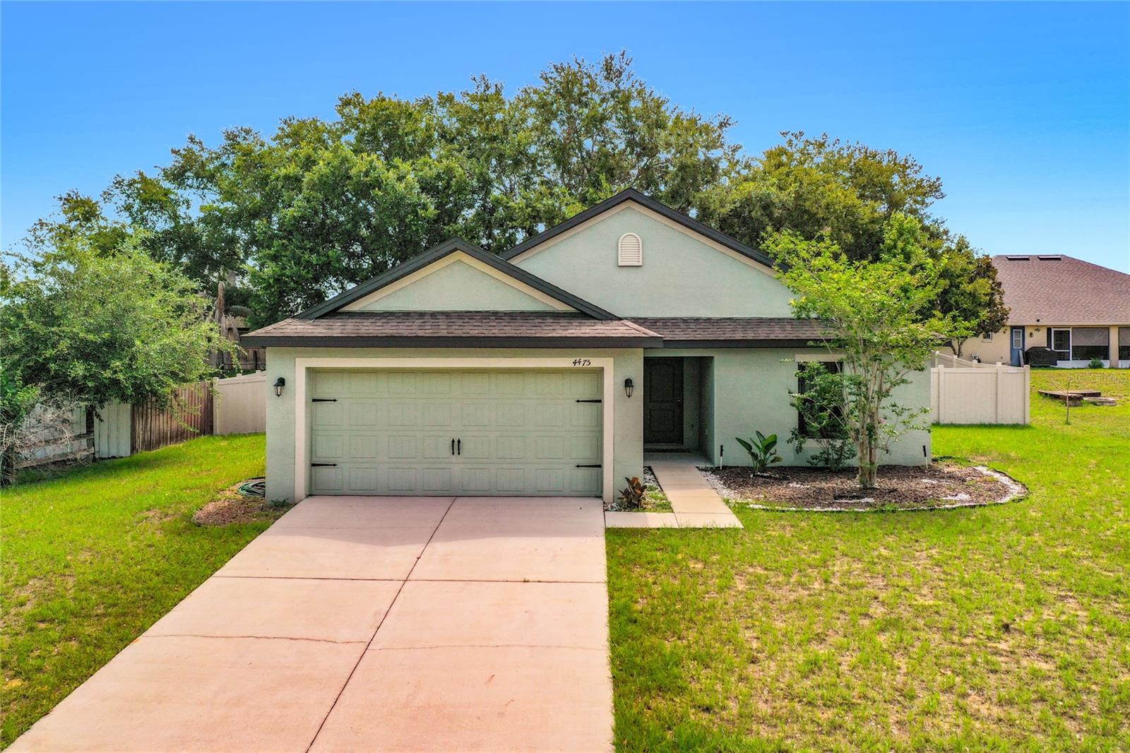 Come take a tour of this ready to move-in newer home built in 2016 in Tavares Groves at Baytree. LOW HOA! This 3-bedroom, 2-bath home packs in almost 1600 sq ft of living space in the beautiful city of Tavares Florida. The SPLIT FLOOR PLAN separates the bedrooms from the shared living areas. Upgrades through the home include DESIGNER NEW LAMINATE FLOORING and UPGRADED LIGHTING FIXTURES. The kitchen has GRANITE COUNTERTOPS with a STAINLESS STEEEL UNDERMOUNT SINK. Outdoors, a private FENCED IN REAR YARD offers a place for animals and kids to run about. The UNIQUE ONSITE AMMENITIES include a FULL SIZE AIR CONDITIONED BASKEBALL COURT and a full-size swimming pool, perfect for year-round recreation. The location of this home is convenient too, its just a short distance to 441 and very close to the Dead River for outdoor activities. Schedule a showing today to take a tour of this home and community and see for yourself how nice this home really is! *SHOWINGS ARE BY APPOINTMENT ONLY*