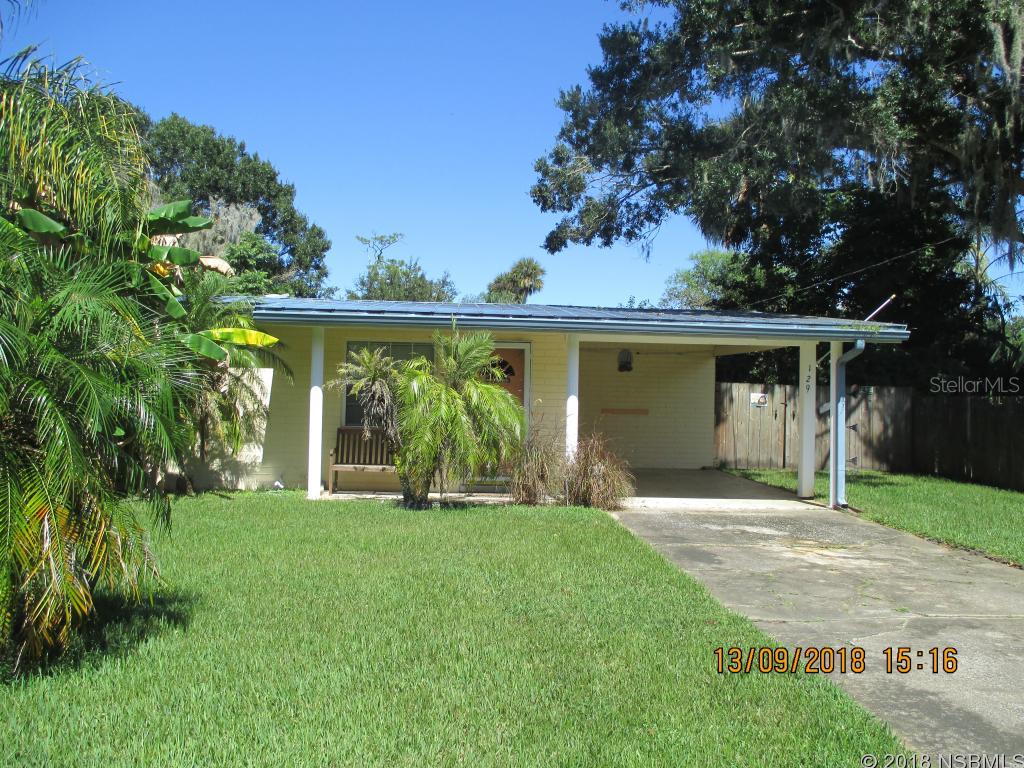Nicely kept home in the Ellison Acres subdivision of New Smyrna Beach.  Convenient to schools, churches, shopping and boating & beaches.  This home features lots of outdoor entertainment options: pavered patio with stone fire pit, large open wood deck and 24'x11' covered deck as well as an 8'x8' Gazebo/Hammock deck. Nice large back yard and plenty of room at the side of the carport for boat or RV. Metal roof in 2009 ;Water: City