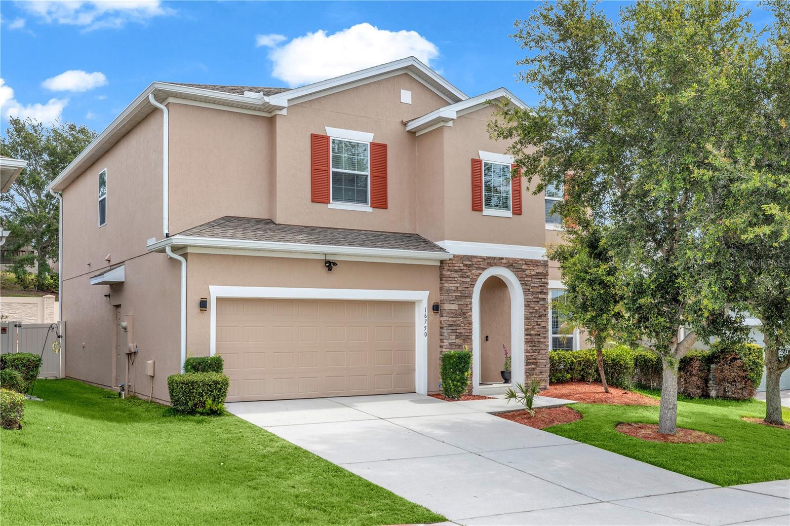 Welcome to this exceptional former David Weekley model home, located in the highly sought-after community of Johns Lake Landing in Clermont. Offering nearly 2,900 Sq.Ft.  of thoughtfully designed living space and a spacious two car garage, this stunning residence blends elegant style, comfort, and functionality for today’s modern lifestyle.

From the moment you enter, you’ll be captivated by the home’s impressive and inviting floor plan, featuring 4 spacious bedrooms and 2.5 bathrooms. At the heart of the home is a beautifully appointed kitchen showcasing premium 42-inch cabinetry, abundant storage, generous counter space, and seamless flow into the bright breakfast overlooking the backyard area and family room, creating the perfect setting for everything from casual mornings to holiday celebrations. Additionally, the property includes a dedicated office/den that can easily serve as a 5th bedroom. 

Upstairs, an oversized loft provides endless possibilities as a second living area, media room, game room, study space, or fitness retreat. The impeccable owner’s suite offers a true private sanctuary, with an ensuite bathroom, and highlighted by a huge, custom-designed walk-in closet featuring built-in shelving, vanity area, and exceptional organization.

Step outside and experience your own backyard oasis. The extended, covered lanai and outdoor kitchen create the ultimate space for year-round Florida living, whether you’re hosting friends, enjoying weekend cookouts, or relaxing after a long day. The expansive backyard is fully enclosed with a 6-foot vinyl privacy fence and offers ample room to design the custom pool of your dreams. Additional updates include new sprinklers, new gutters. This is a home that has been meticulously maintained and is truly move-in ready.

Residents of Johns Lake Landing enjoy resort-style amenities including a sparkling community pool, covered cabana, playground, and more!Outdoor enthusiasts will appreciate the close proximity to the Johns Lake public boat ramp and the renowned West Orange Trail, featuring over 22 miles of paved biking, walking, and running paths.

Conveniently located near top-rated schools, shopping, dining, Florida’s Turnpike, major highways, and world-famous theme parks, this home offers the perfect balance of luxury, convenience, and lifestyle. Don’t wait, schedule your private showing today!