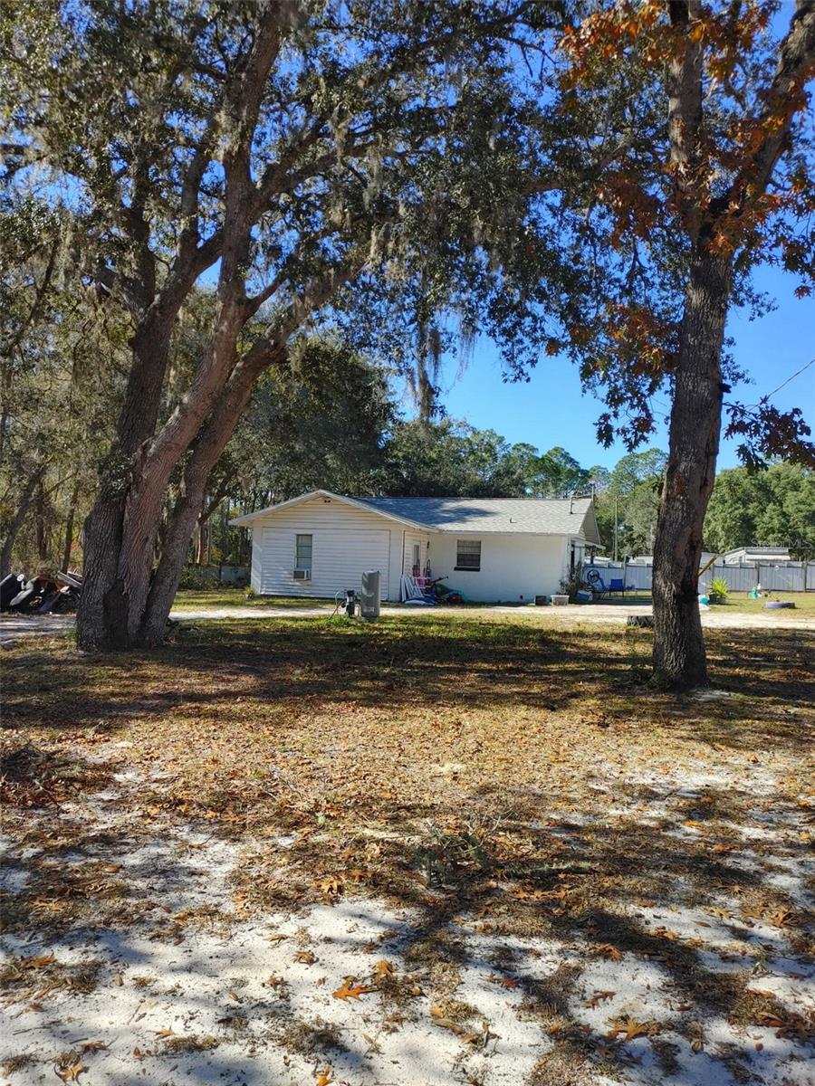 ATTENTION! Bring your Mother in law because this LEGAL HORSE RANCH / FARM has 2 Homes on 3 Acres! The main front house is a 2/2 and the rear guest house is a 2 or 3/1…with separate addresses and utilities…rear guest house had a recent complete roof replacement and interior renovation…currently leased for $1,750.- month to a stable, middle aged couple thru July…2/2 front house is currently vacant and just freshly renovated inside and out…ready to move in for the new owner or lease it out for $2,000.- month…for sale by motivated, recently retired, Senior owner…this is a Grandfathered large animal farm / ranch for up to 12 horses…Veterinary clinic / Hospital…farm stand and other agricultural related businesses…RV and boat friendly!