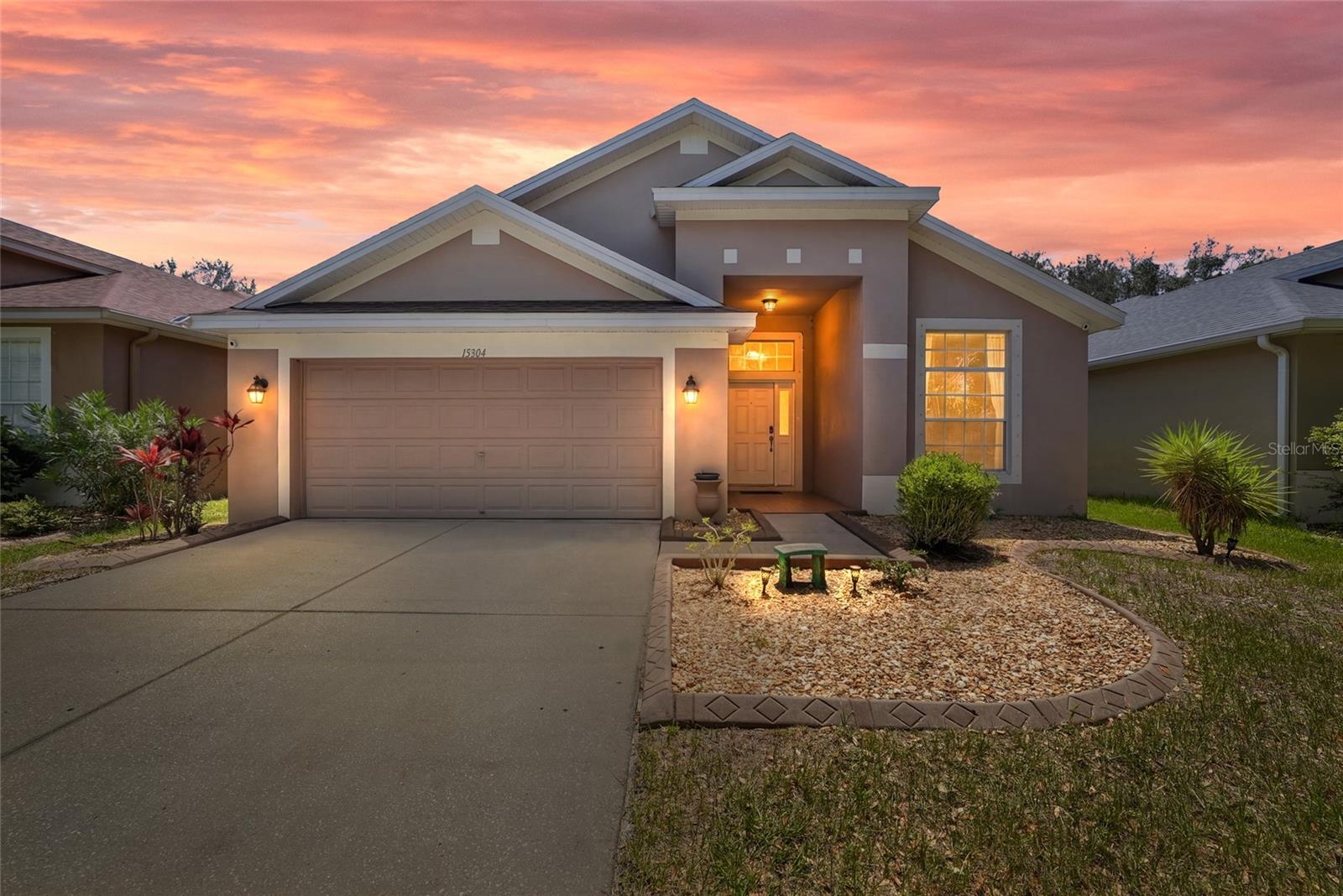 Ready for immediate move-in, this beautifully maintained one-story home is located in the sought-after South Fork community and offers the perfect blend of space, comfort, and convenience. Featuring 4 bedrooms, 2 bathrooms, and a versatile floor plan, this home is designed to fit a variety of lifestyles. The spacious interior showcases high ceilings, granite countertops, natural gas, and easy-to-maintain flooring throughout the main living areas, with carpet reserved for the bedrooms. A flexible formal dining room can easily serve as a home office, playroom, or additional living space, while built-in desks and decorative display niches in each bedroom add both function and charm. The private primary suite features a relaxing soaking tub and direct access to the backyard. Outside, enjoy a beautifully landscaped, low-maintenance backyard complete with artificial turf, custom landscaping, and a hot tub, perfect for relaxing or entertaining. A washer and dryer are included, and rent includes front lawn maintenance, internet, and Wi-Fi. Residents also enjoy access to South Fork's community amenities and a prime location with quick access to US-301, I-75, the Selmon Expressway, shopping, dining, and everyday conveniences. Schedule your private showing today and make this exceptional home yours.