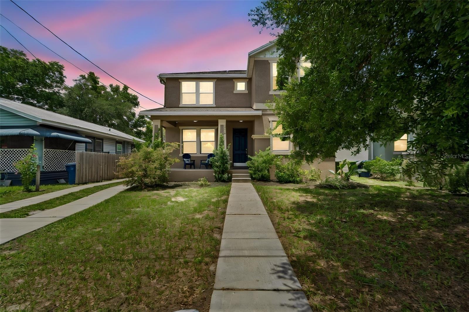 Welcome to 1216 E Giddens Avenue, a spacious two-story home in Seminole Heights built in 2017. The home features a covered front porch, an open floor plan, and plenty of natural light. The kitchen offers quartz countertops, tall cabinetry, stainless steel appliances, a range hood, breakfast-bar seating, and ample storage. A first-floor bedroom and full bathroom provide flexibility for guests or a home office. Upstairs, the primary suite includes a tray ceiling, walk-in closet, dual vanities, soaking tub, and separate shower. Additional bedrooms, a full bathroom, and upstairs laundry complete the second floor. Outside, enjoy a covered patio, deck area, fenced yard, storage shed, and off-street parking. Conveniently located near Seminole Heights restaurants, parks, Downtown Tampa, Tampa International Airport, and major roadways.
