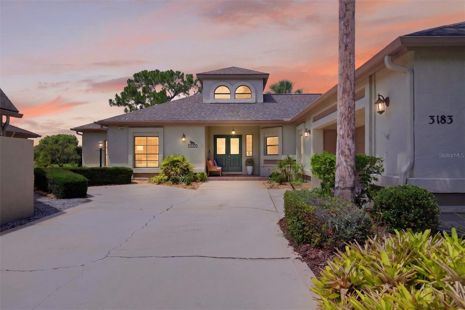 Fabulous Neighborhood, Fabulous Lifestyle! If you're a pilot, an avid golfer, or just someone looking for a beautiful home, in a beautiful setting, then this is the home for you. The Spruce Creek Fly In is one of the most sought-after private ''fly in'' community in Florida. Overlooking the 17th tee, this bright and updated home offers a large master suite with his and hers closets, a spa-like bath and private access to a large, enclosed lanai for relaxing and watching the golfers tee off. The large living room has a fully-refurbished, wood-burning fireplace with a wall of windows overlooking the golf course. The kitchen has been remodelled and includes custom cabinets, quartz countertops, two pantries, plus newer stainless steel appliances. All the big-ticket items, like roof, HVAC, and Tankless hot water heater have been taken care of for you. Ask for a full list of updates and upgrades this home has to offer. Located in the Wedgewood section of the Spruce Creek Fly In,

your HOA dues include a community pool with a cabana, lawn care with weed control & fertilizer, irrigation/sprinkler system and exterior painting every 8 Years.

The Spruce Creek Fly-In offers a private paved and lighted runway with a GPS approach, and is home to approximately 440 aircraft, over 1300 luxury homes, commercial hangars, restaurant, salon, 24 hour gated/staffed security, a children's playground and a Country Club with optional memberships available.

Additional amenities: 18-hole golf course, lighted tennis courts, pickle ball, fitness center, pool and many social activities.
And.....only a short, 15-minute drive to the beaches of Daytona, and a large variety of dining and shopping choices.