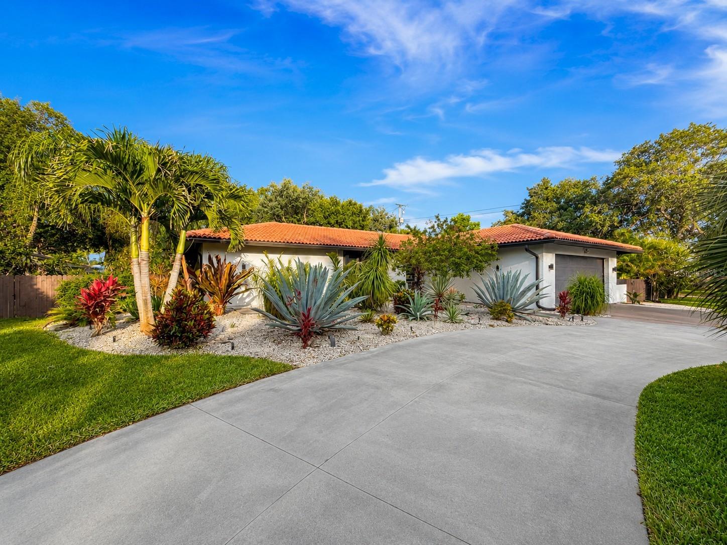This stunning Nokomis pool home blends modern luxury with exceptional Florida living. Nestled on a beautifully landscaped lot with mature tropical greenery, this property offers privacy, style, and functionality throughout. The open-concept interior features designer finishes, a show-stopping chef’s kitchen, spa-inspired bathrooms, and high-end upgrades from top to bottom. Step outside to your private backyard retreat with an expansive outdoor living area, oversized 8-foot deep heated saltwater pool, screened lanai, and fully fenced yard—perfect for entertaining, relaxing, or enjoying year-round coastal living. Low HOA, no CDD fees, and access to highly rated schools with convenient neighborhood bus transportation make this beautifully updated property an exceptional choice for both families and long-term value. A rare turnkey opportunity combining sophisticated indoor updates with incredible outdoor amenities in one of Nokomis’ most desirable locations. Conveniently located near Nokomis Beach, shopping, dining, and top-rated schools, this beautifully remodeled property offers easy access to both Sarasota and Venice.
