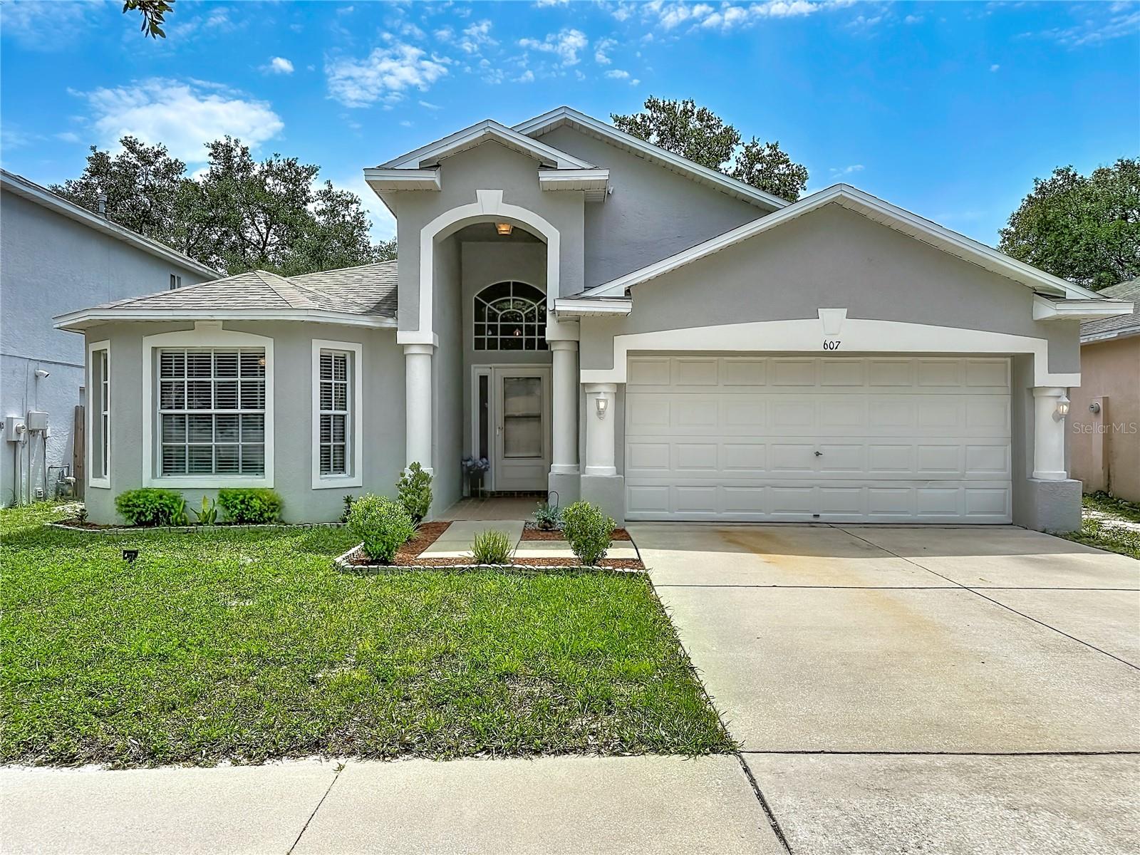 If you’re looking for a move-in ready 4 bedroom, 3 bathroom home with major updates already completed, a screened lanai built for year-round living, and a location that keeps Tampa, Brandon, and everyday conveniences close by, this one stands out immediately. Offering 2,344 gross square feet and 1,808 heated square feet on a 50-foot by 100-foot lot, this beautifully maintained home also features a freshly painted exterior, giving it a crisp, well-cared-for look from the start.
From the moment you step inside, soaring cathedral ceilings and an open, light-filled layout create a bright, welcoming atmosphere that feels both spacious and functional. The kitchen is equally impressive, featuring solid granite countertops, modern appliances, and plenty of room to cook, gather, and stay connected with family and guests.
Built in 2001 and lovingly cared for, this home includes important updates that make ownership easier from day one. The roof was replaced on March 31, 2020, and the HVAC system received updated ductwork with the final permit closed in 2020. With the home’s major high-ticket items already addressed, you can move in with confidence and focus on enjoying the home instead of worrying about costly repairs.
One of the true standouts is the covered and screened lanai with exceptionally tall ceilings. This expansive outdoor living space is ideal for entertaining, weekend cookouts, morning coffee, or simply relaxing after a long day while enjoying Florida’s beautiful weather year-round.
The spacious two-car garage provides room for vehicles, storage, a workshop, or even a home gym, while the privately fenced backyard offers the perfect setting for a garden, pets, gatherings, or simply unwinding among the mature landscaping.
Located in a well-maintained community with an extremely low quarterly HOA fee, residents enjoy maintained sidewalks, landscaped common areas, neighborhood infrastructure, and paved roads without the burden of high association costs. The home is also located in a non-flood zone, so flood insurance is not needed or required by a lender.
Conveniently situated just minutes from Tampa, Brandon, and major commuter routes, you’ll also have easy access to shopping centers, restaurants, golf courses, entertainment, hotels, and local attractions. Florida’s award-winning Gulf beaches and vibrant downtown St. Petersburg are approximately 45 to 60 minutes away.
If you’ve been waiting for a move-in ready home that combines comfort, thoughtful updates, exceptional outdoor living, and an unbeatable location, this is the one to stop for, share, and schedule. All information is deemed reliable but not guaranteed. Buyer and buyer’s agent to verify all information and conduct their own due diligence. Schedule your private showing today and see why this home deserves a spot at the top of your list.