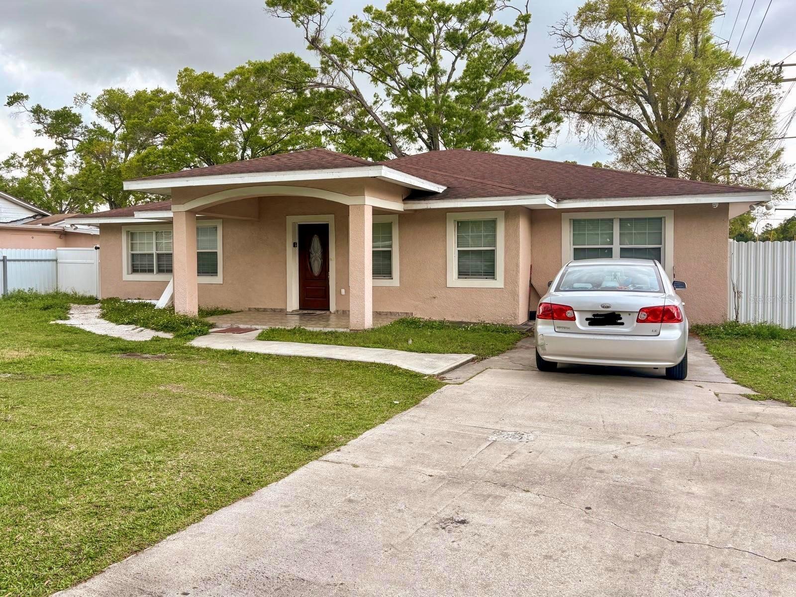 Location, Location, Location! Beautiful and spacious 2-bedroom, 1-bath rental home in a prime central Tampa location. Conveniently located just minutes from Tampa International Airport, major highways, shopping centers, restaurants, schools, and entertainment. This well-maintained home features an open living and dining area, a spacious kitchen with elegant marble countertops, ceramic tile flooring throughout, and fresh interior paint. Enjoy the large covered patio and private backyard, perfect for relaxing or entertaining. The property also offers parking for up to four vehicles. Bright, comfortable, and move-in ready.