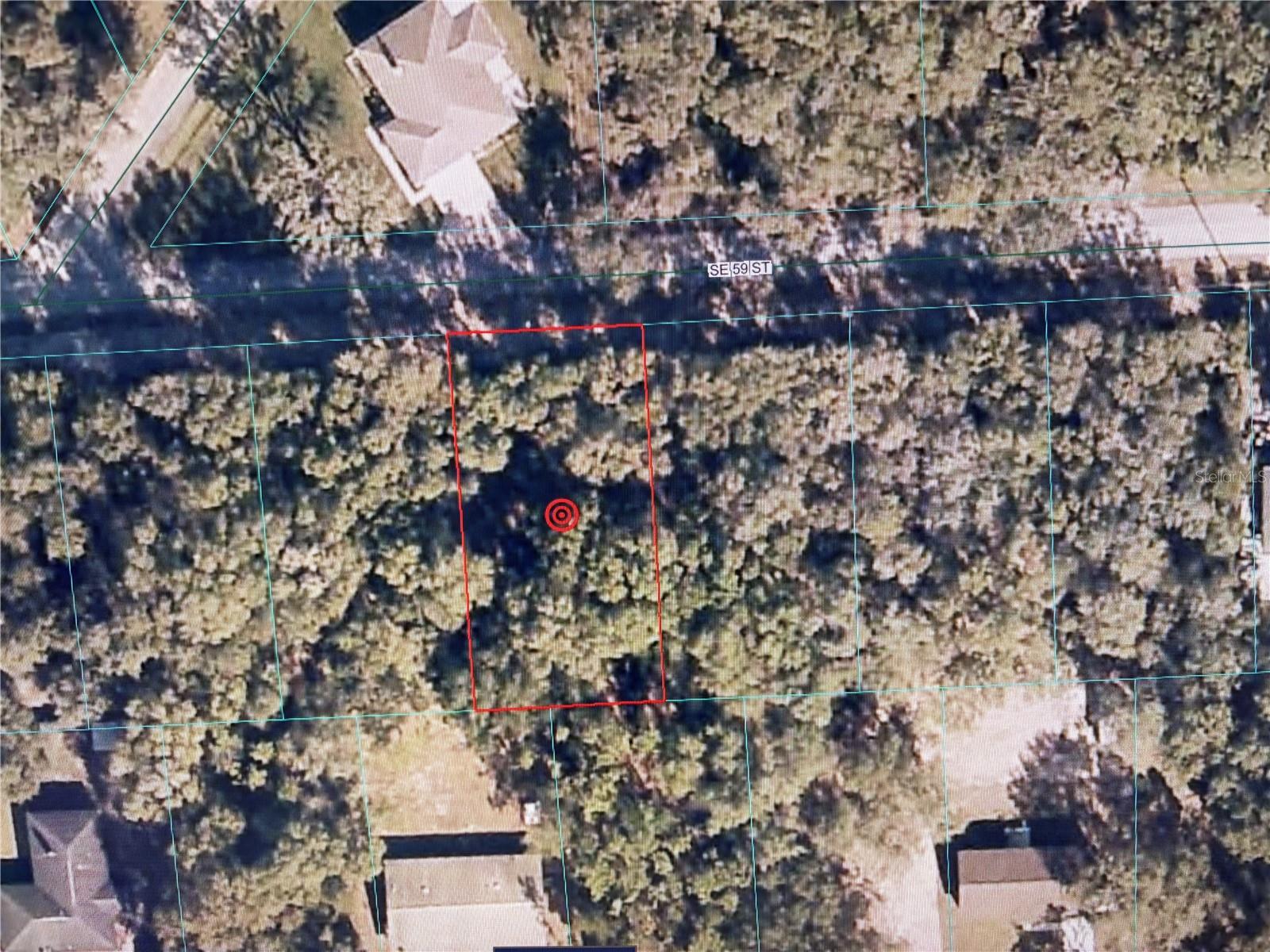 Great lot to build your dream home in the Woods & Lakes neighborhood! Large .28 acre lot! Site built homes only! Paved road. No HOA and no flood zone. Quiet neighborhood. Easy drive to Ocala, Belleview, and the Villages. Close to the Ocala National Forest with ATV trails, horse trails, hunting, and fishing close by. Also close to Juniper Springs, Alexander Springs, Silver Springs, Silver Glen Springs, and about an hour from Ormond and Daytona Beach. For GPS, use house address across the street ~ 16575 SE 59 St.