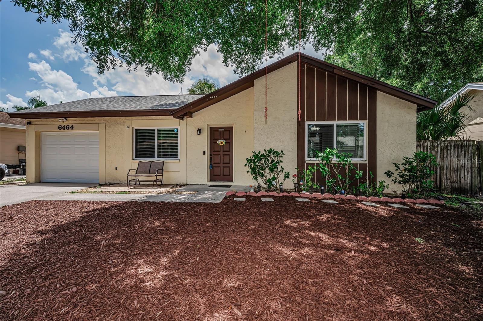 Some homes on the market ask you to imagine the potential. This one just hands it to you. Tucked in Beacon Run, one of Pinellas Park's most sought-after communities, this 2-bedroom, 1-bath home just got a brand new roof (July 2026) and pairs it with a location that does most of the selling itself. Step inside and the story continues. Fresh paint and matching updated vinyl flooring run throughout the main living areas. The kitchen backs it up with granite countertops, newer stainless steel appliances, a pantry giving you ample storage space in addition to the beautiful wood cabinetry, and recessed lighting that makes the whole space feel bigger and brighter. The bathroom carries that same matching granite and cabinet through on its updated vanity, alongside a newer toilet and a Bluetooth exhaust fan that streams your music while you get ready. It's a small feature, but the kind you'll actually use every day and brag about to guests. Outside, a very spacious, fully fenced backyard gives you room for pets, play, or a quiet evening outdoors. It's a clean slate for your desired space. The 1-car garage covers parking and storage. Windows and the sliding glass door were replaced in recent years and every fixture in the home is new. The major components in this home have already been handled. The HVAC system, ductwork, and A/C were fully replaced in recent years and now run on a Nest thermostat, and the garage door was replaced as well. That's years of big-ticket maintenance someone else already took care of. Location closes the deal. Beacon Run sits minutes from Bryan Dairy Road, with quick access to I-275 and the new express lanes, putting Tampa International Airport and downtown St. Pete within easy reach. Pinellas County's award-winning beaches are less than 25 minutes away. Work near Tampa, spend your weekends on the Gulf, and come home to a quiet street. New roof, no flood zone, no HOA, updated systems throughout, and a location this central rarely all line up in one house. When they do, buyers move on it fast. Schedule your showing now, before someone else beats you to it.
