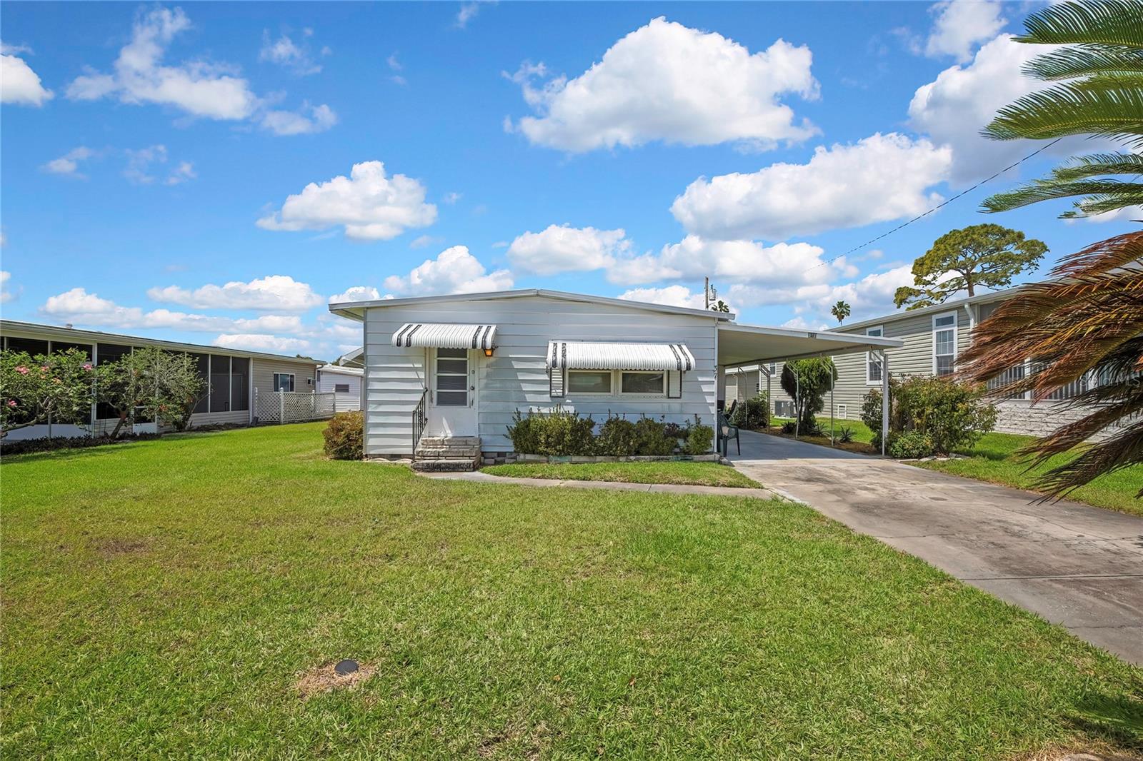 Price Reduced !!! Located in a peaceful Lake Tarpon established 55+ community, this 1964 mobile home presents a fantastic opportunity for buyers looking to renovate and make a home their own. Full of potential, this property is ideal for those with a vision to update, restore, or customize a space to fit their lifestyle.

The home offers a functional layout with a large living area, kitchen, and two bedrooms ready for transformation. Whether you're planning a light refresh or a full renovation, this property provides a solid starting point to create a comfortable and personalized retreat.

Beyond the home, the community itself is a standout feature. Residents enjoy access to a neighborhood pool, shuffleboard courts, and a variety of organized social events that foster a vibrant and active lifestyle. With a low HOA, you can take advantage of these amenities while keeping monthly expenses manageable.

Outside, the manageable lot offers space to relax, garden, or entertain—perfect for enjoying Florida’s year-round sunshine. The community’s welcoming atmosphere and lifestyle-focused amenities make it an ideal setting for those looking to stay active and connected.

Conveniently located near shopping, dining, and everyday essentials, this property combines accessibility with the charm of a laid-back, community-oriented environment.

If you’re seeking an affordable project in a desirable 55+ community with great amenities, this is a rare opportunity to bring your vision to life and create the perfect home.