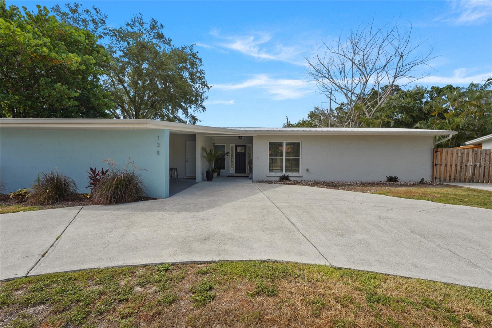 Welcome to 138 Holly Avenue, nestled in the highly sought-after Whitfield Estates, where timeless charm meets modern comfort just moments from the sparkling waters of Sarasota Bay. Beautifully renovated from top to bottom, this move-in-ready residence offers 2,187 square feet of thoughtfully designed living space on over a quarter-acre, creating the perfect blend of style, functionality, and everyday luxury.

From the moment you step inside, you’ll appreciate the home’s bright, open feel. Expansive sliding glass doors and oversized windows flood the interior with natural light, seamlessly connecting the indoor living spaces to the outdoors. Designer lighting, dimmer switches throughout, and elegant finishes create the perfect ambiance from sunrise to sunset, while the spacious layout offers comfortable living and effortless entertaining.

The beautifully updated kitchen is equipped with stainless steel appliances, complemented by quality finishes and an inviting flow into the main living areas. Additional peace of mind comes with a brand-new roof, hurricane-impact windows and doors, and meticulous updates throughout, allowing you to simply unpack and enjoy.

Step outside to your private, oversized backyard, where there’s plenty of room to entertain, garden, add a pool, or simply unwind while enjoying beautiful Florida sunsets. It’s an outdoor space designed for relaxing evenings and making lasting memories.

Location truly sets this home apart. Just steps from Sarasota Bay, you’re minutes from vibrant downtown Sarasota, Sarasota-Bradenton International Airport, IMG Academy, world-renowned Gulf beaches, waterfront dining, shopping, and entertainment. Around the corner, Sara Bay Marina offers convenient boat slips and dry storage, making it easy to embrace Sarasota’s coveted boating lifestyle.

Whitfield Estates remains one of Sarasota’s hidden gems, offering no mandatory HOA and no CDD fees, providing flexibility for full-time residents, seasonal homeowners, or investors alike. An optional $40 annual neighborhood association includes culinary membership privileges at the prestigious Sara Bay Country Club.

Whether you’re searching for your forever home, a seasonal retreat, or a smart investment, 138 Holly Avenue offers the perfect balance of location, quality craftsmanship, modern updates, and effortless Florida living—all in one of Sarasota’s most desirable waterfront neighborhoods.
