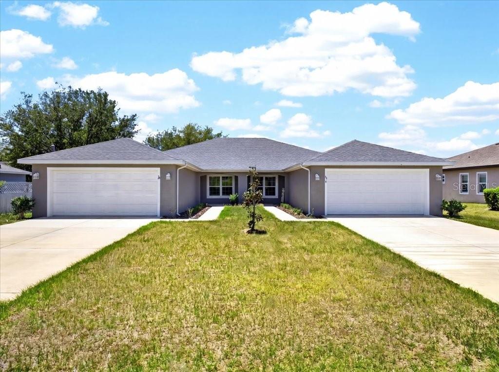 Stunning Duplex! Built in 2023, this stunning duplex offers the perfect blend of modern design, functionality, and investment potential in the heart of Palm Coast, Florida. The popular Patterson model by SeaGate Homes features a spacious open-concept layout with a combined 3,063 sq. ft. of heated living space and 4,204 total sq. ft.

Each unit offers 4 bedrooms, 2 bathrooms, a 2-car garage, and an ample driveway, providing comfort and convenience for homeowners and tenants alike. Inside, you’ll find elegant ceramic tile and luxury vinyl plank flooring throughout, modern kitchens with quartz countertops, stainless steel appliances, and sliding glass doors leading to private patios; perfect for indoor/outdoor living.

Constructed with durable block construction, installed new rain gutters; and washable paint throughout that repel stains and withstand heavy scrubbing; offering superior durability over standard paints. This property features a total of 8 bedrooms, 4 bathrooms, and 4 garage spaces, making it an exceptional opportunity for investors or multi-generational living. Live on one side and rent the other, or maximize income potential by renting both units; it’s your home, your choice.

Ideally located in desirable Palm Coast, close to shopping, dining, parks, and Florida’s beautiful beaches, this move-in-ready duplex is a rare opportunity you won’t want to miss.