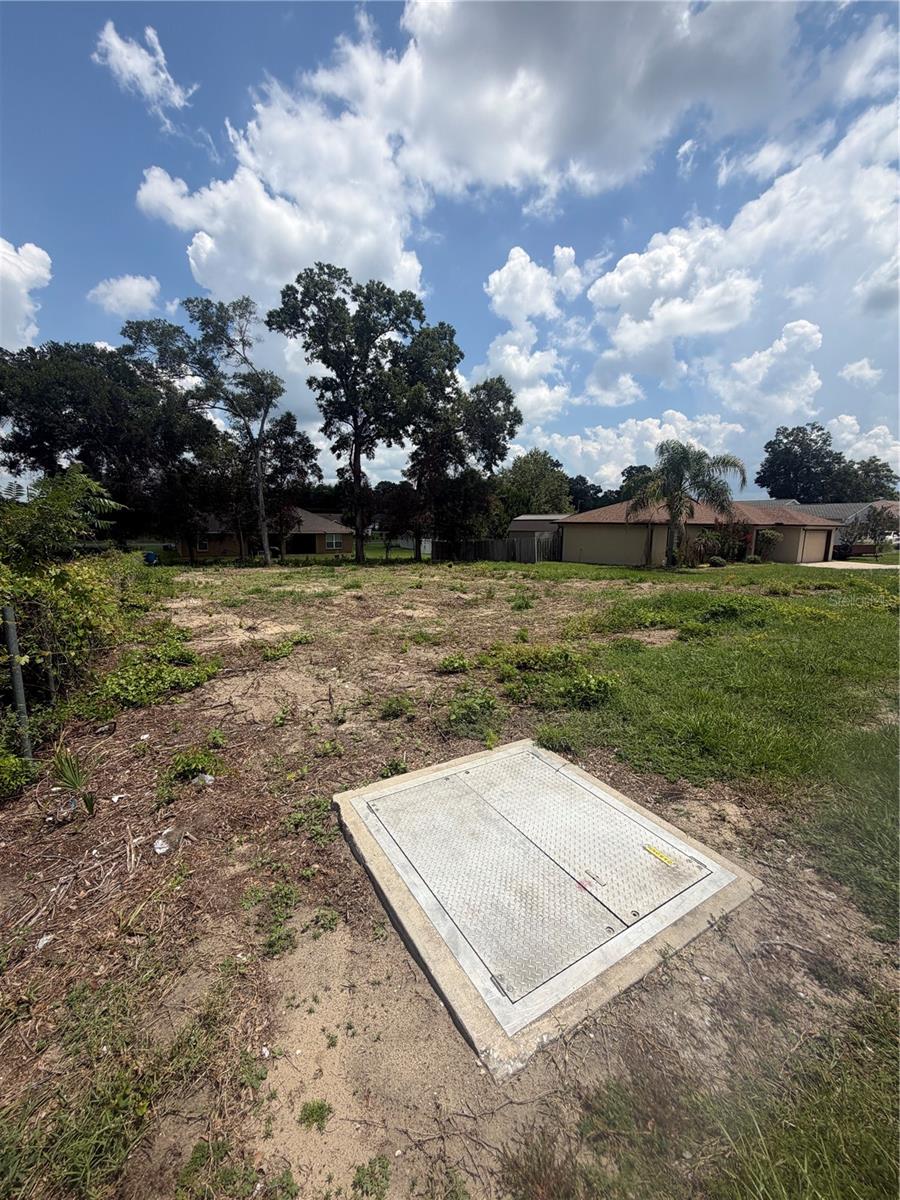 Lot is cleared and ready to build. Conveniently located across from The Villages for all your dining and shopping needs.