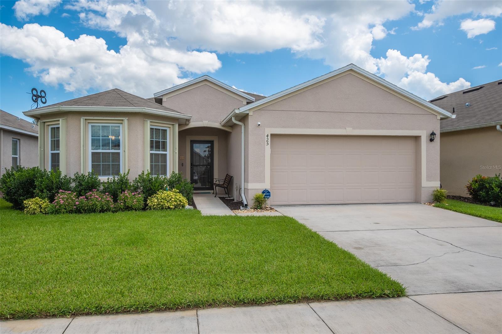 Better-than-new & immaculate, this beautiful one-owner home has been lived in only 3.5 years with superb maintainance and the addition of many upgrades - plus it is only 6 miles to the beach! **Be sure to view 3D virtual tour!!** From the front breakfast nook in a bay window to the screened back patio over looking woods and pasture (no neighbors behind), there is so much to love in the spacious 3 bedroom, 2 bath home in a gorgeous new neighborhood. The home features a large master suite with walk in closet and a lovely bathroom with dual vanities, gorgeous curb appeal with lush lawn and landscaping, and a sunny, spacious and inviting open floor plan. Owners have added *many* $1,000's in upgrades including decorative lighting, new "pet proof" carpet, accordian hurricane shutters for whole house including screen porch, interior paint, flooring in attic for storage, white vinyl privacy fencing, gutters, front storm door, new ceiling fans in all rooms, keyless front entry and extra shelving in closets and the garage. This impressive, stylish move-in-ready home is a must see for sure! Located in one of New Smyrna Beach's hottest neighborhoods, Sabal Lakes, which features a community pool with gazebo, easy access to the adjacent New Smyrna Beach multi-use trail to Turnbull Creek and conveniently close to shopping and I-95. ;Water: City