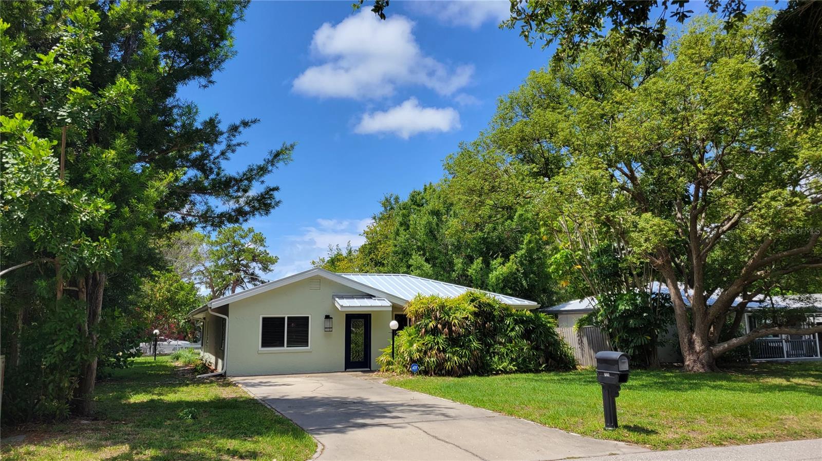 Available for an annual lease. This 3-bedroom, 2-bathroom home is located "West of the Trail" in the highly desirable Sapphire Shores area. The home features a newer roof along with recently installed impact windows and doors for added peace of mind and energy efficiency. Inside, the property offers a comfortable layout with 3 bedrooms and 2 full bathrooms. The exterior includes a large, grassy yard, a screened-in lanai off the back of the house, and a separate exterior laundry room that provides extra storage space. This property is pet-friendly. The location is tough to beat. You are situated just south of the Ringling Museum and blocks away from local Bayfront parks like Sapphire Shores Park, where you can watch the sunset over Sarasota Bay. It is also a quick drive to the Sarasota-Bradenton International Airport (SRQ), New College, Ringling College, and all the dining, shopping, and entertainment in downtown Sarasota. Call today to schedule a showing and make this your next home!