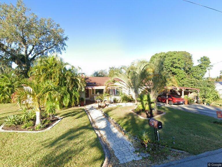 Welcome to your private Florida oasis. Thoughtfully maintained and beautifully updated over the past 18 years! This move-in-ready home combines modern upgrades with the charm and lifestyle that make Florida living so desirable. Inside, you’ll find real hardwood flooring throughout, stunning quartz kitchen countertops (2013), fully remodeled bathrooms, and spacious living areas designed for comfort and functionality. Major improvements provide peace of mind, including storm windows (2011), HVAC system (2020), a newer roof, complete home replumbing (2026), and a recent preventative termite tenting treatment with protection extending for the next five years. Outdoor enhancements include a newly rescreened lanai, Leaf Filter gutter system, and new metal roofing over the carport and rear patio (2025). Step outside to enjoy a fully fenced backyard featuring mature fruit trees, attractive paver landscaping, and plenty of space to relax or entertain while embracing the natural Florida lifestyle. A standout feature of this property is the two large bonus rooms, a home office, gym, media room, playroom, or hobby space-tailored to fit your needs and lifestyle. True Florida Charm is waiting for you.