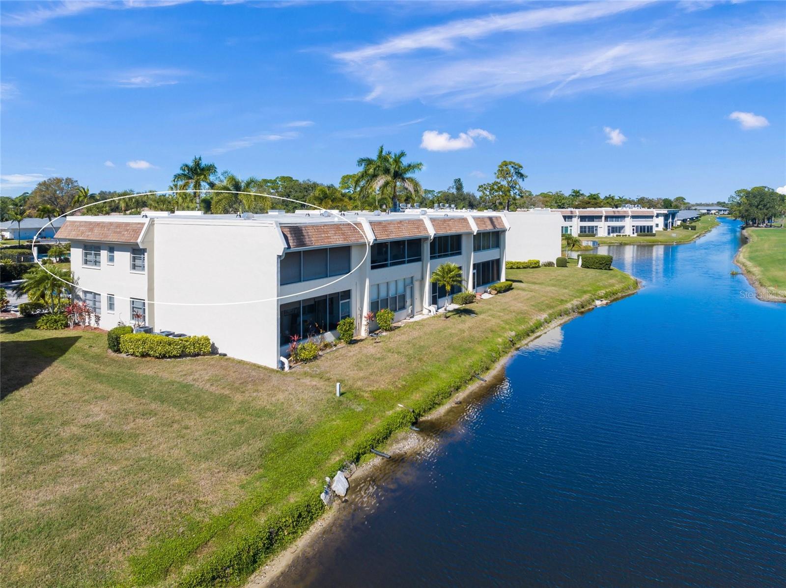 This is a must see property ~ experience 180 degree gorgeous golf course and lake views.....Beautifully updated 2nd-floor condo in the highly sought-after Palm Aire community, a Golf Community, with optional memberships. This light and bright unit features an updated kitchen, beautiful cabinets, granite countertops, newer appliances and a stylish backsplash, added bonus of IMPACT WINDOWS and sliders, newer hot water heater, newer AC unit, and no carpet!  Enjoy peaceful mornings overlooking expansive views and stunning sunsets from your vantage point. Ideally located near shopping, dining, and major roadways. A must-see Palm Aire gem!